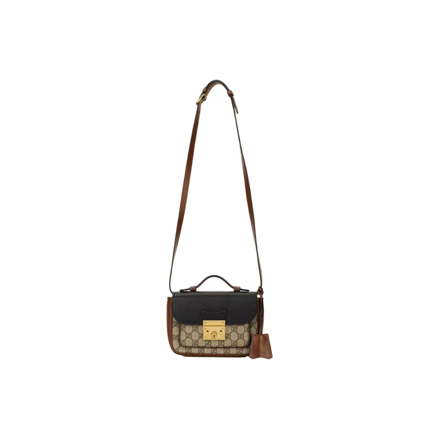 Gucci The latest and most dazzling summer messenger bag from the G family, the high-end classic brown tree lambskin is paired with black, which l
