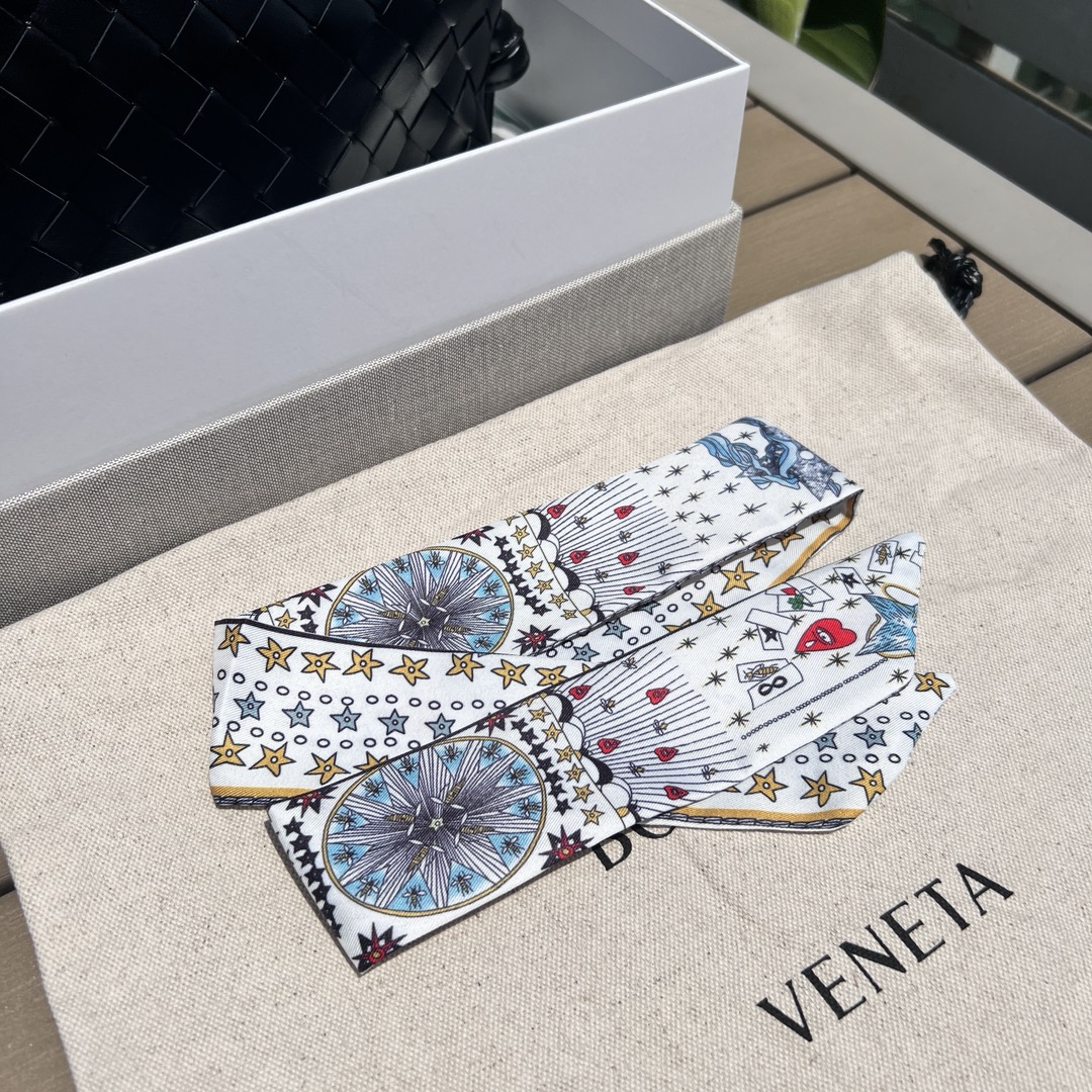 Bottega Veneta Each Loop Cross-Body crossbody bag comes with a random branded high-end silk scarf.