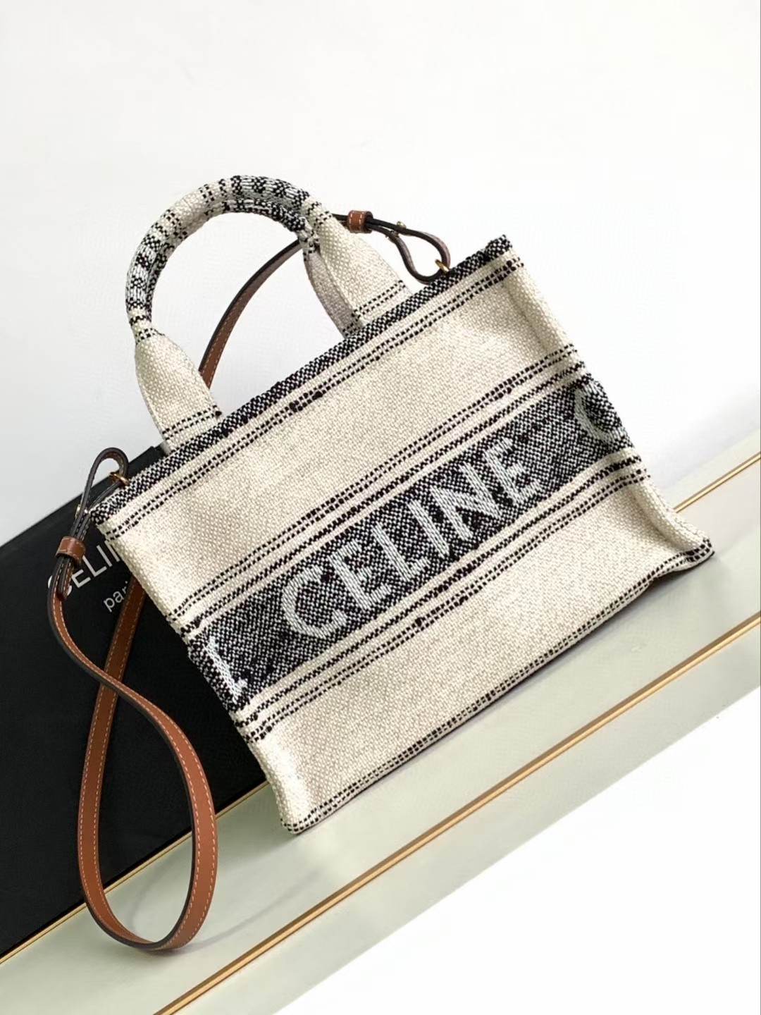 Celine Summer feedback58823s summer|CABAS THAIS small Arc de Triomphe striped fabric cowhide handbag