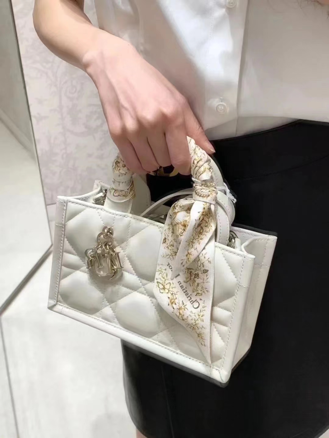 Dior Mini white upper body figure