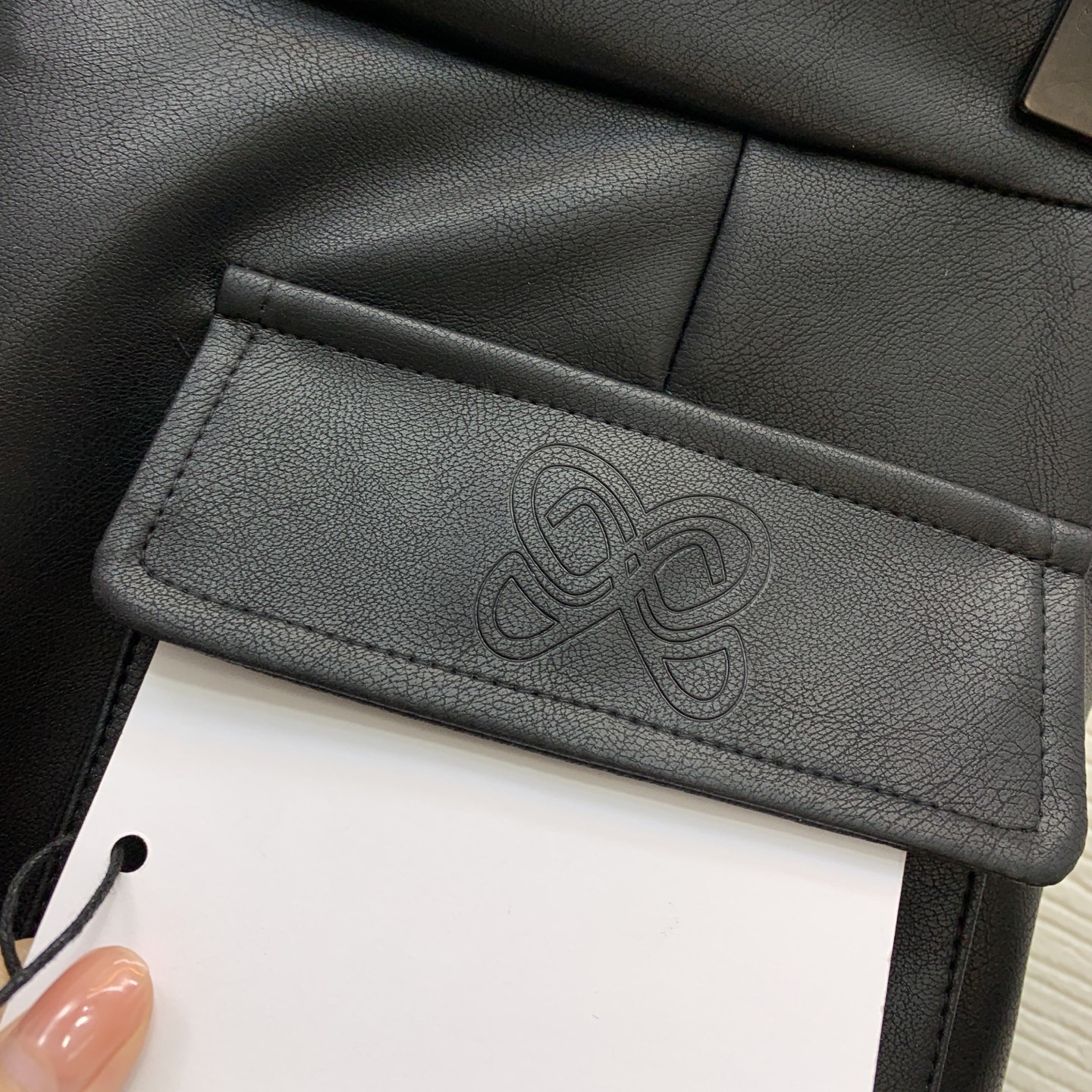 款号D ANNANDELM*N新款 定制优质PU皮面料logo翻盖立体口袋工装风时尚酷帅A字短裙半身裙！