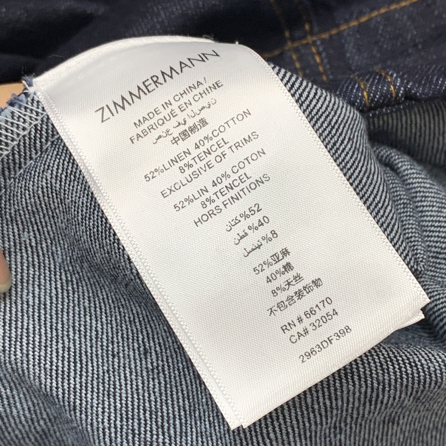 款号G ZIMMERMA*N 兹默曼澳洲品牌高端定制洗水牛仔棉面料、字母logo金色纽扣翻盖装饰大裙摆、