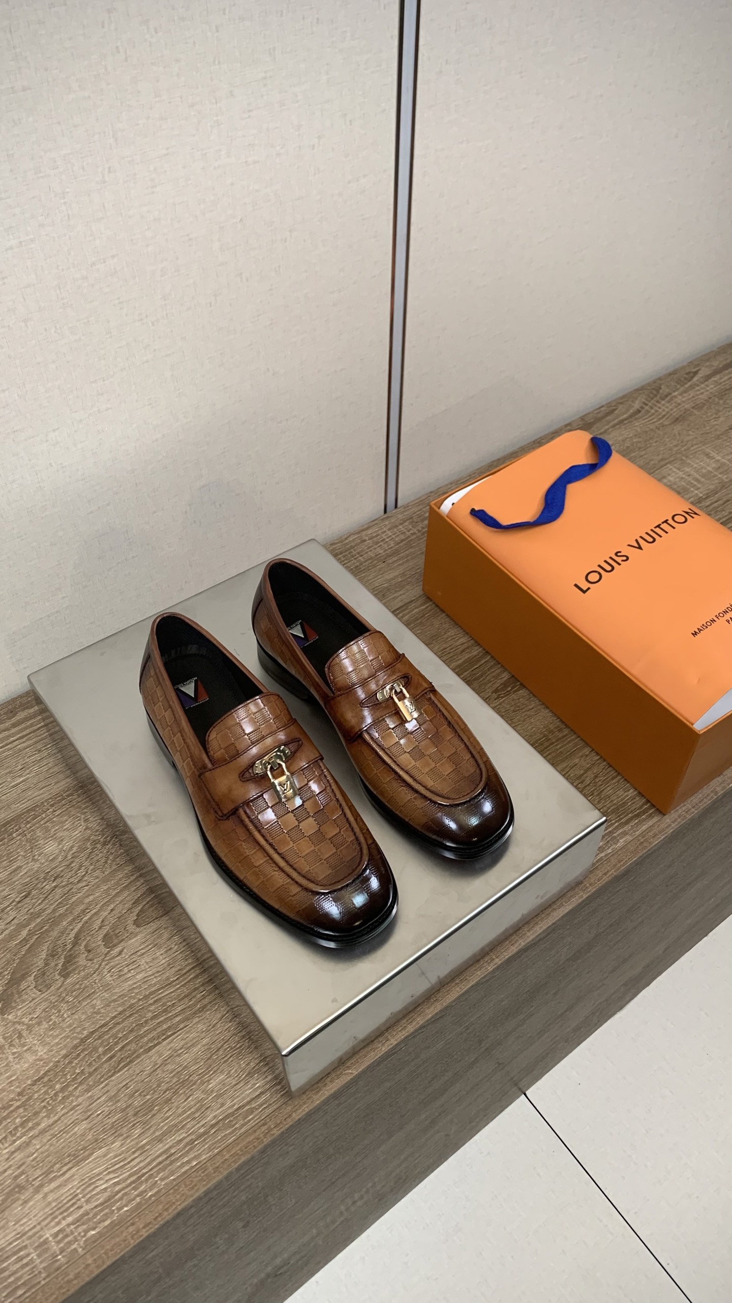 Louis Vuitton Men's Brown Leather Loafers with Embossed Detailing