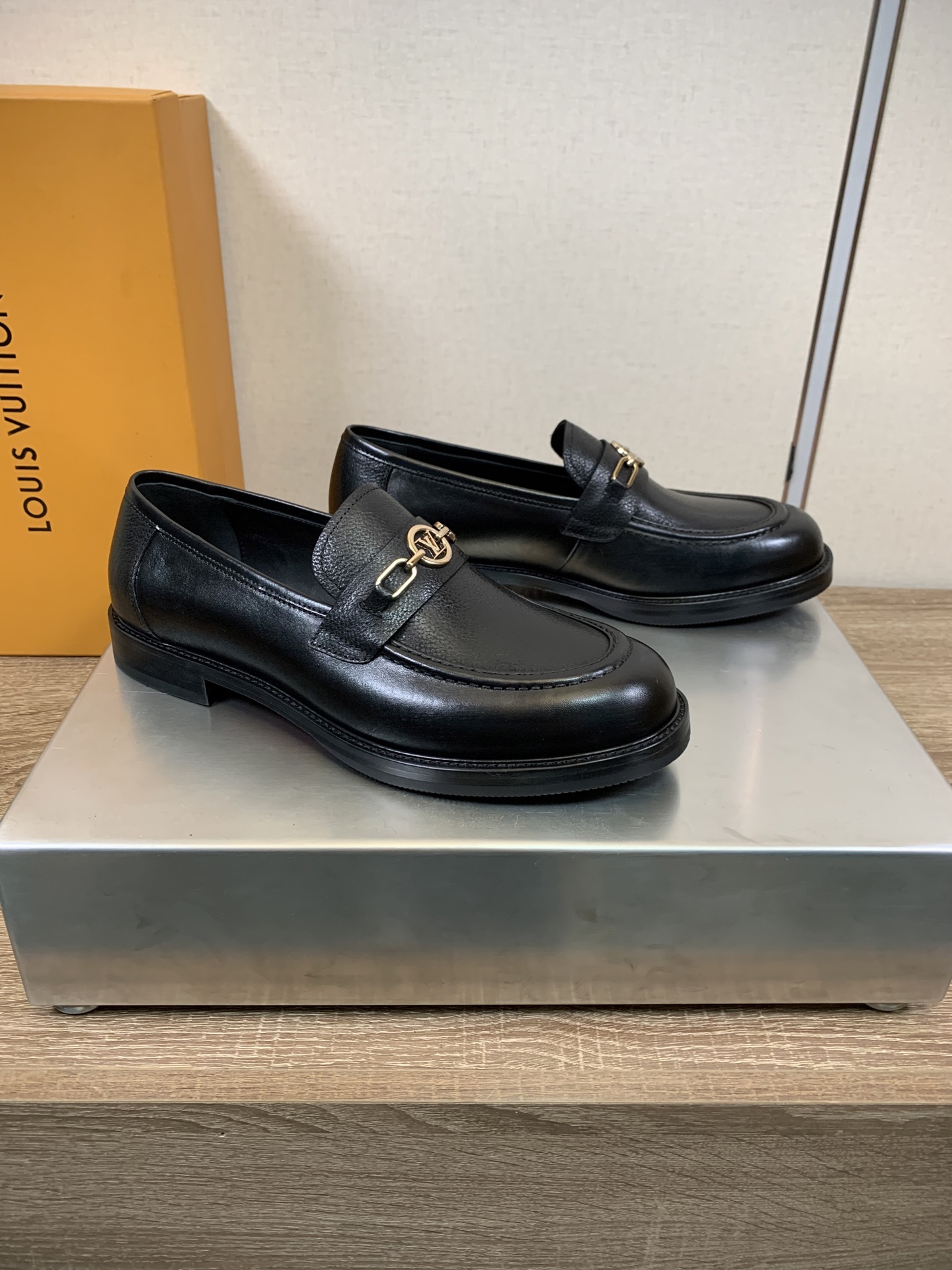 Louis Vuitton Men's Black Leather Loafers with Gold-Tone Hardware 4 i1756924985395 3885 0 2