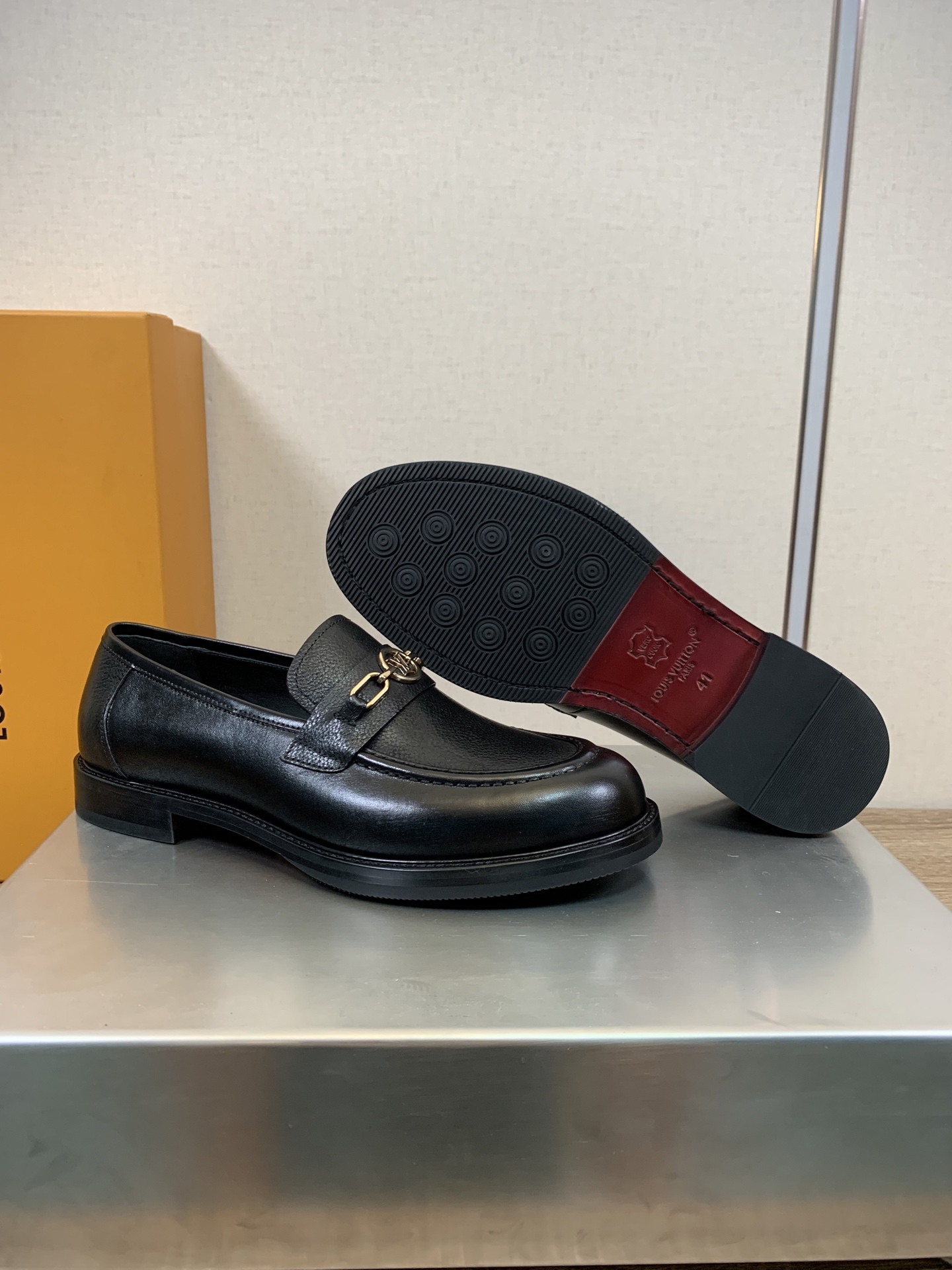 Louis Vuitton Men's Black Leather Loafers with Gold-Tone Hardware 7 i1756924989960 4325 0 3