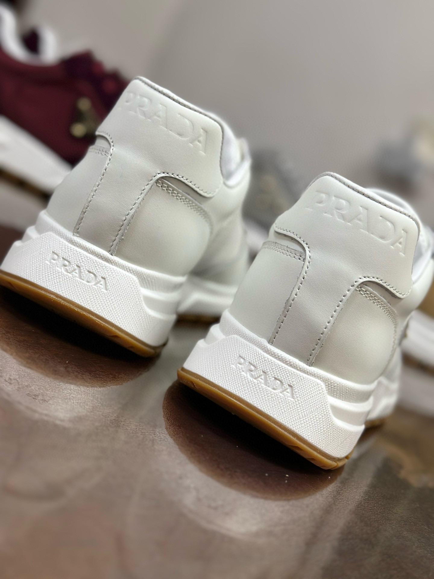Prada Prax 2.0 White Leather Sneakers with Perforated Design and Iconic Logo 4 i1751161838014 4981 0 2