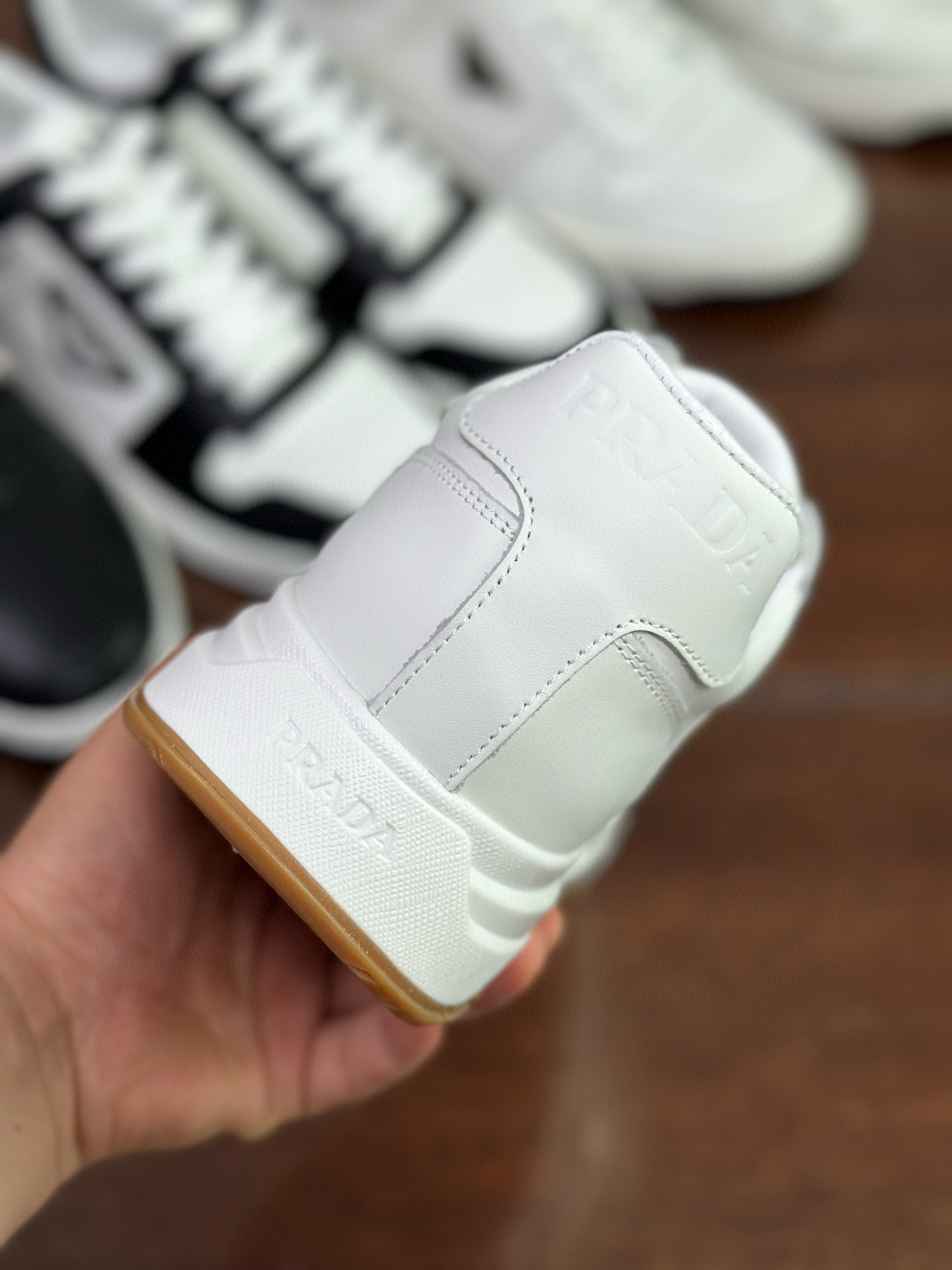 Prada Prax 2.0 White Leather Sneakers with Perforated Design and Iconic Logo 10 i1751161838014 8346 0 8