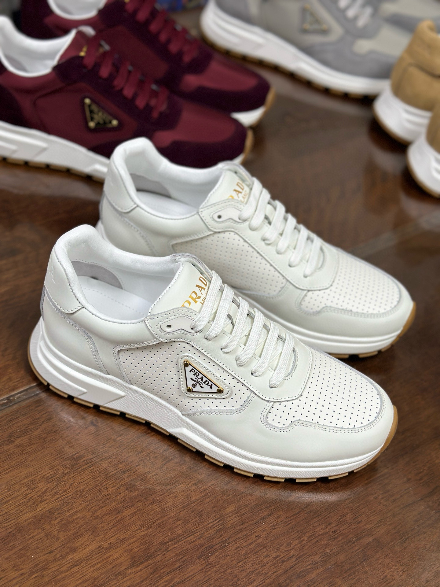 Prada Prax 2.0 White Leather Sneakers with Perforated Design and Iconic Logo 3 i1751161838295 9203 0 1