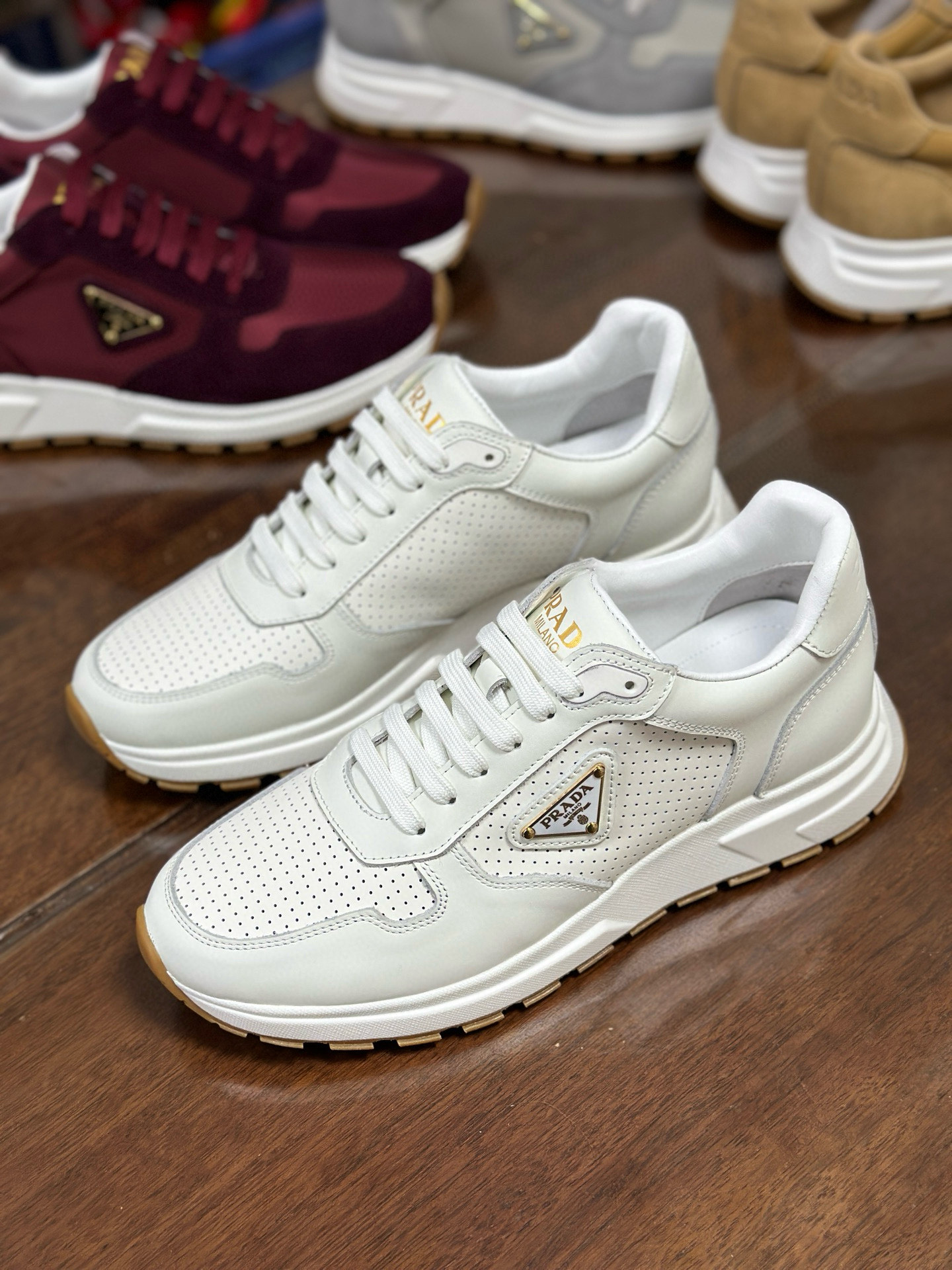 Prada Prax 2.0 White Leather Sneakers with Perforated Design and Iconic Logo