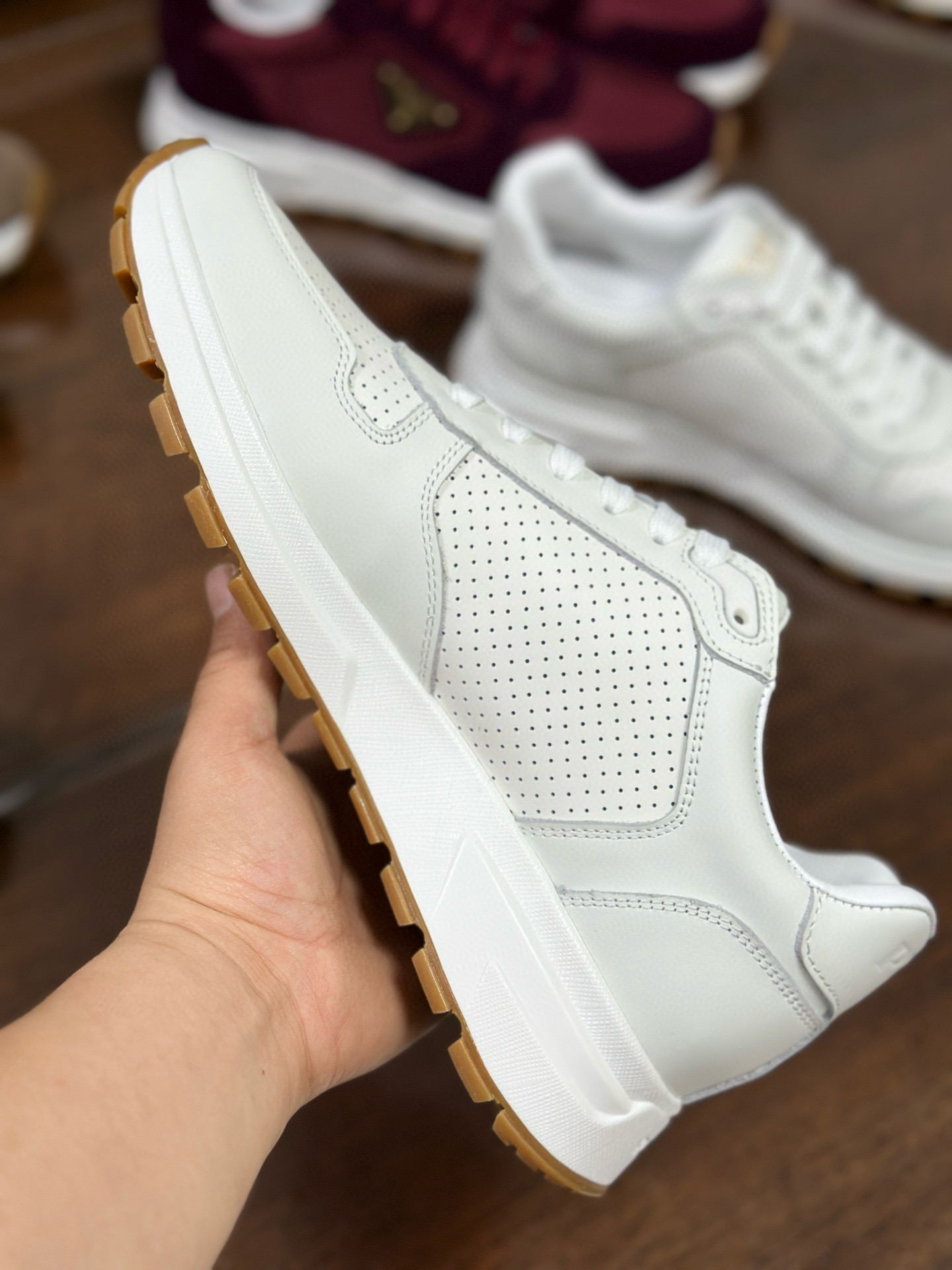 Prada Prax 2.0 White Leather Sneakers with Perforated Design and Iconic Logo 8 i1751161838568 2921 0 6
