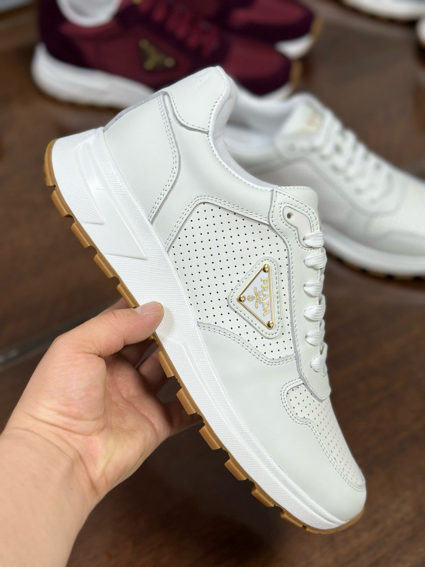 Prada Prax 2.0 White Leather Sneakers with Perforated Design and Iconic Logo 5 i1751161838568 5764 0 3