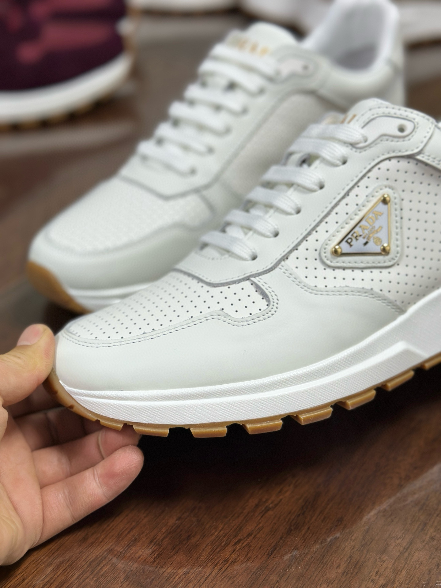 Prada Prax 2.0 White Leather Sneakers with Perforated Design and Iconic Logo 9 i1751161838568 6441 0 7