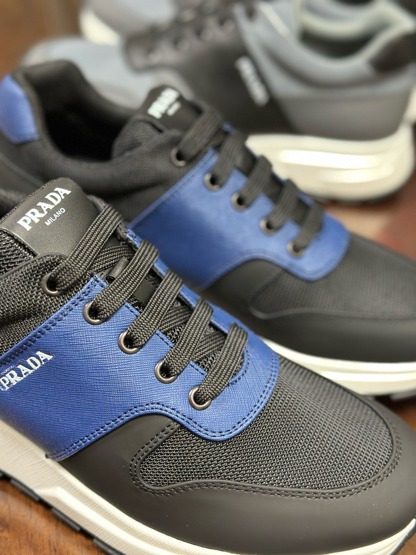 Prada Men's Leather and Mesh Sneakers: Italian Craftsmanship, Stylish Comfort 9 i1752284385358 8994 0 7