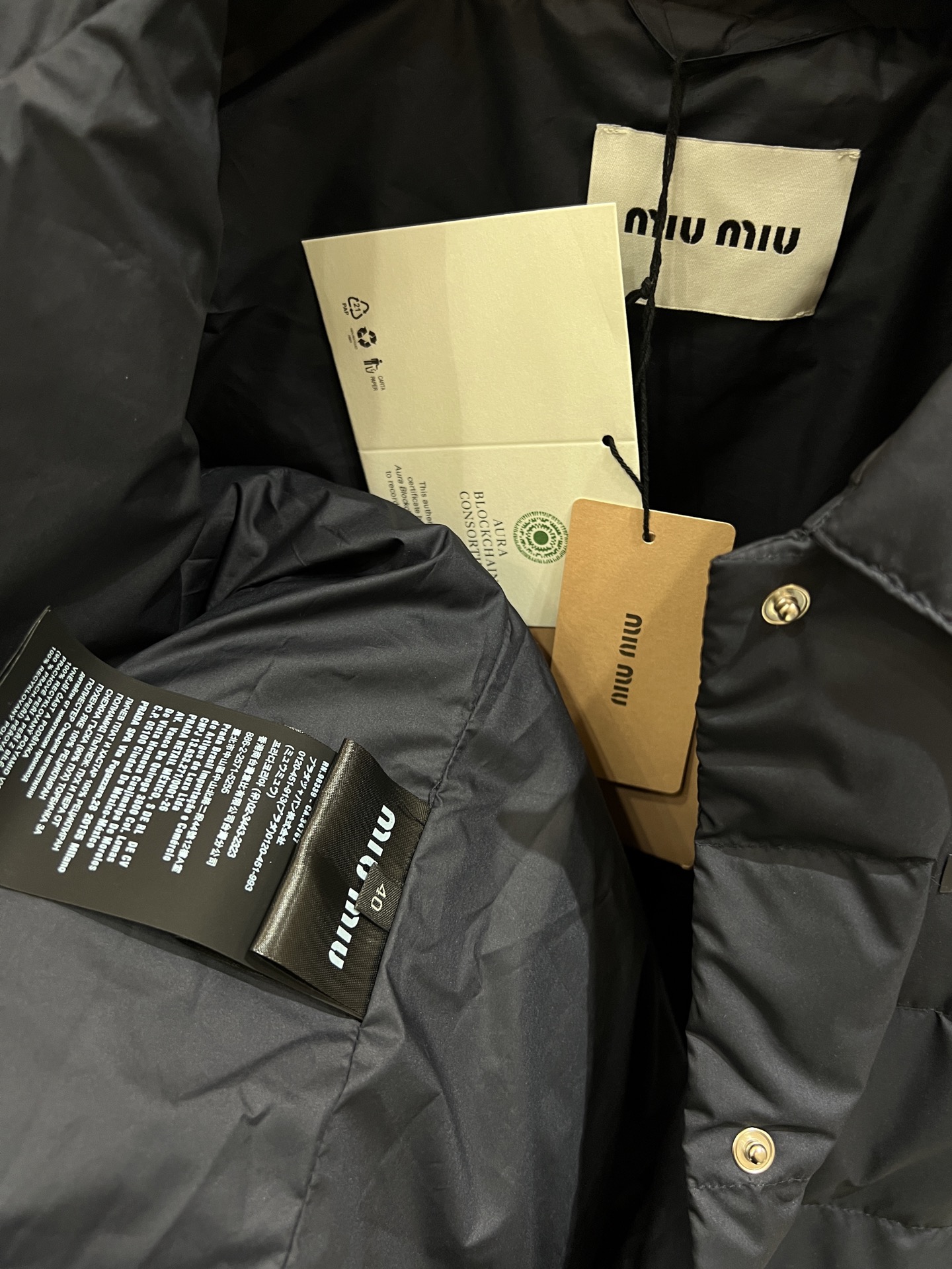 Miu Miu Quilted Down Vest: Stylish & Lightweight Outerwear 6 i1764357062664 4995 0 4