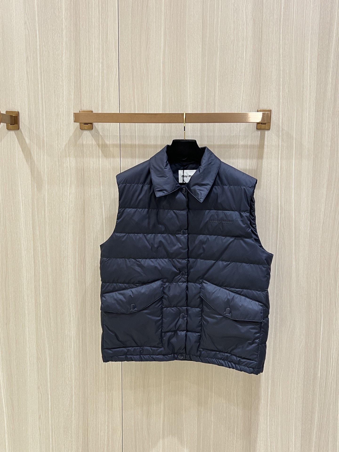 Miu Miu Quilted Down Vest: Stylish & Lightweight Outerwear