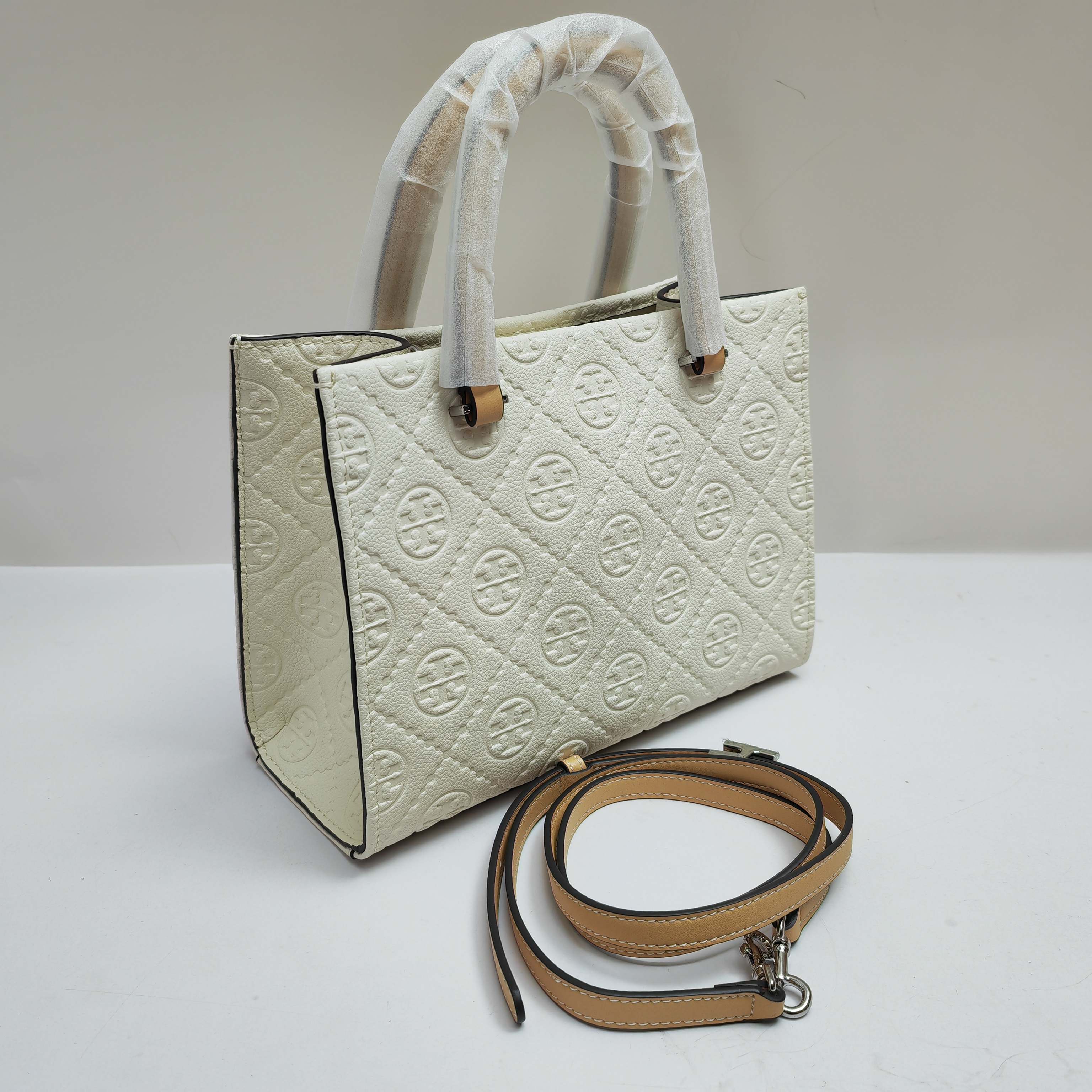 Tory Burch TB新款、 手提斜挎包搭配压花皮革 魅力隽永又风格独具 牛皮手提托特包 配有可拆卸斜挎背带