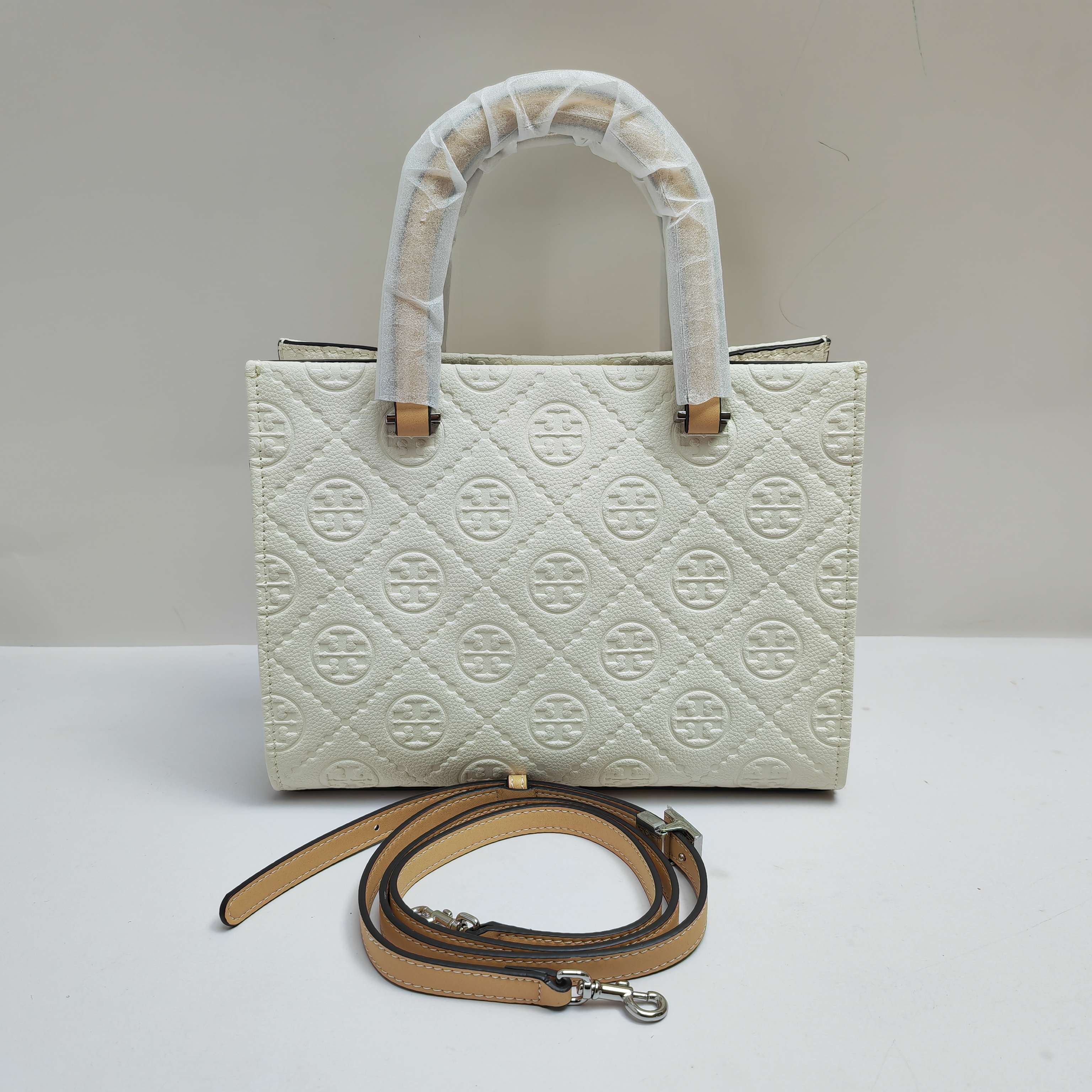 Tory Burch TB新款、 手提斜挎包搭配压花皮革 魅力隽永又风格独具 牛皮手提托特包 配有可拆卸斜挎背带