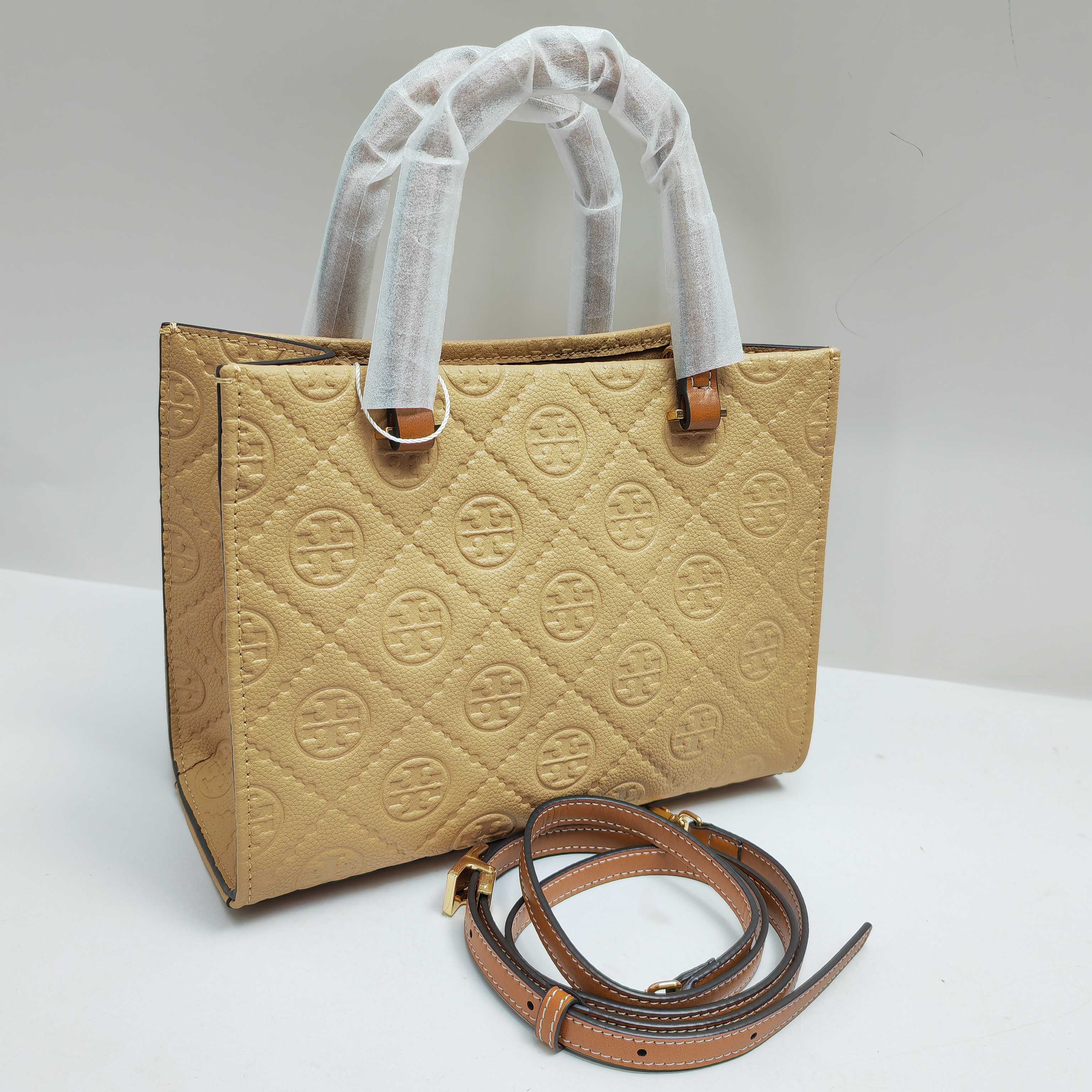 Tory Burch TB新款、 手提斜挎包搭配压花皮革 魅力隽永又风格独具 牛皮手提托特包 配有可拆卸斜挎背带