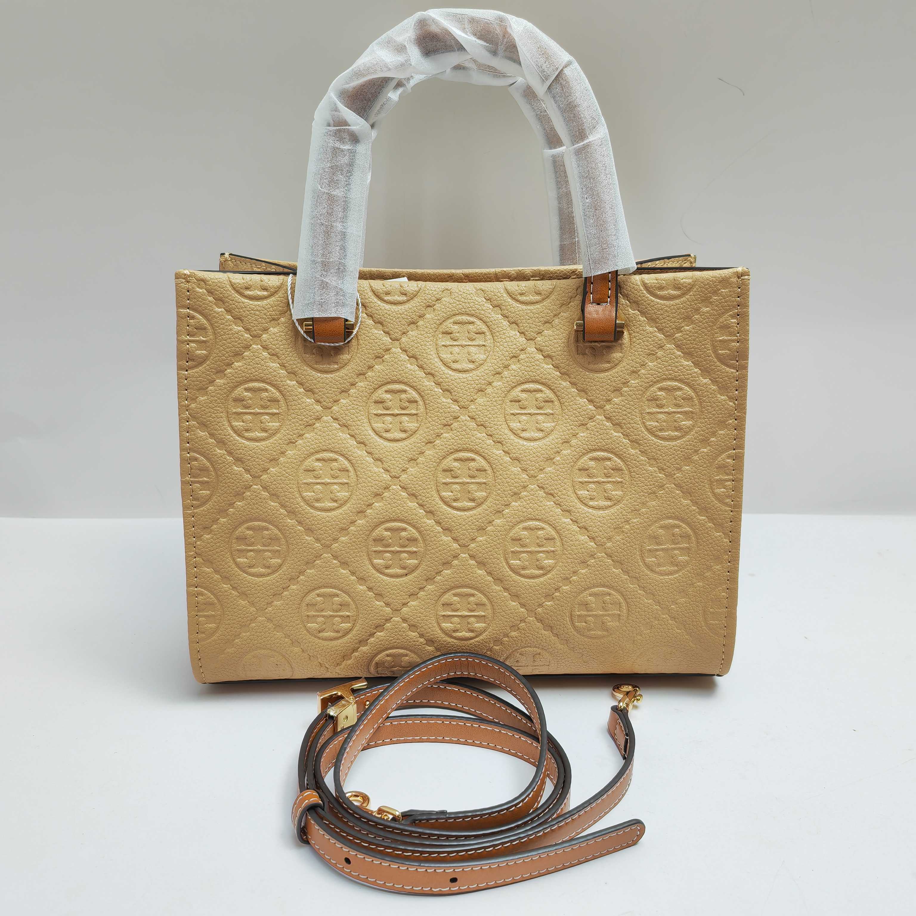 Tory Burch TB新款、 手提斜挎包搭配压花皮革 魅力隽永又风格独具 牛皮手提托特包 配有可拆卸斜挎背带