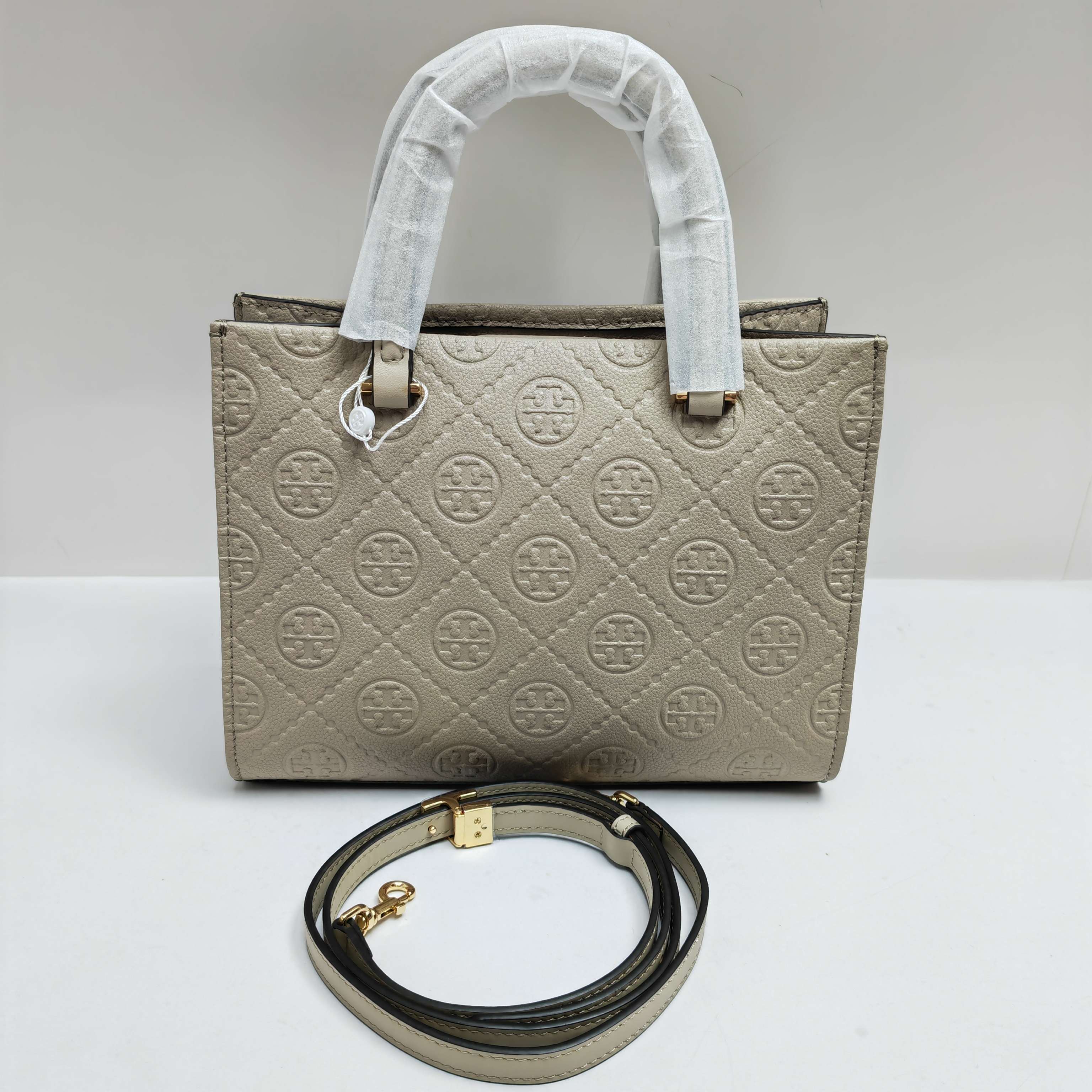 Tory Burch TB新款、 手提斜挎包搭配压花皮革 魅力隽永又风格独具 牛皮手提托特包 配有可拆卸斜挎背带