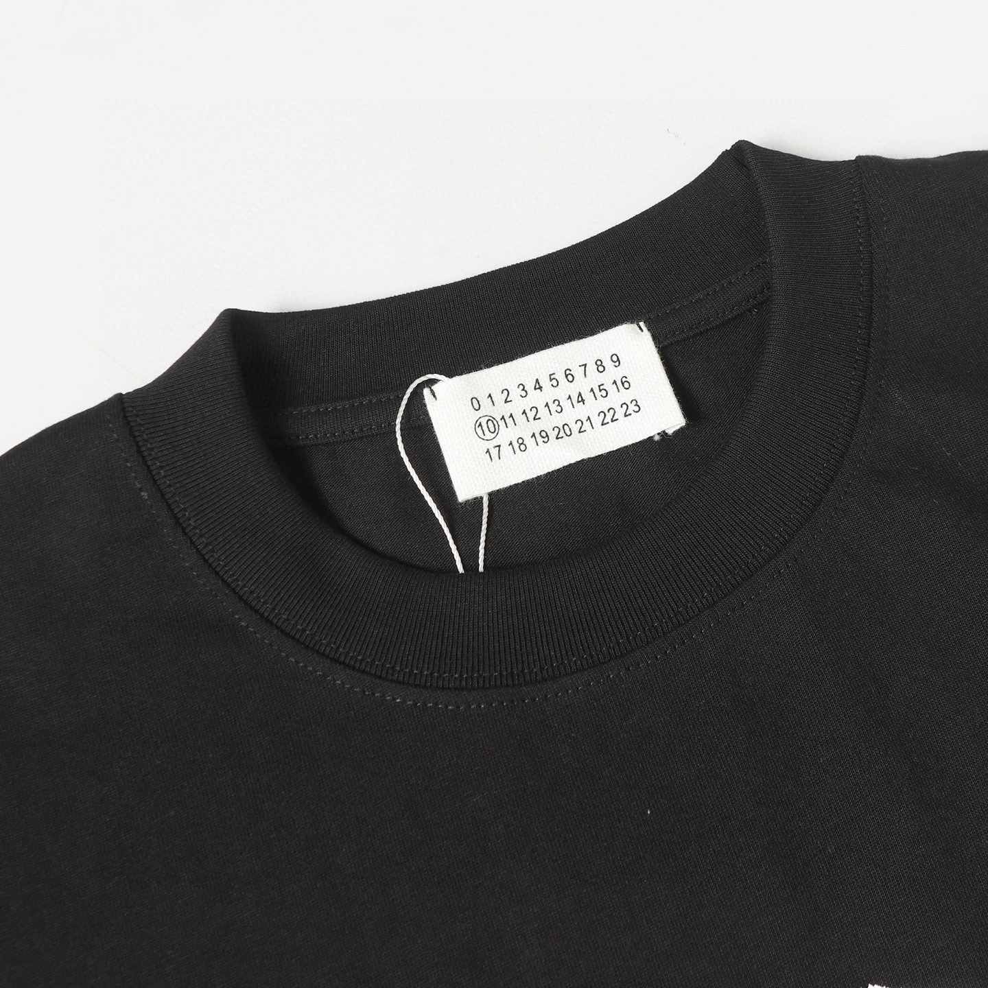 Supreme x MM6 Maison Margiela Camiseta de Manga Corta con Diseño Gráfico 9 i1749985804517 6994 0 7