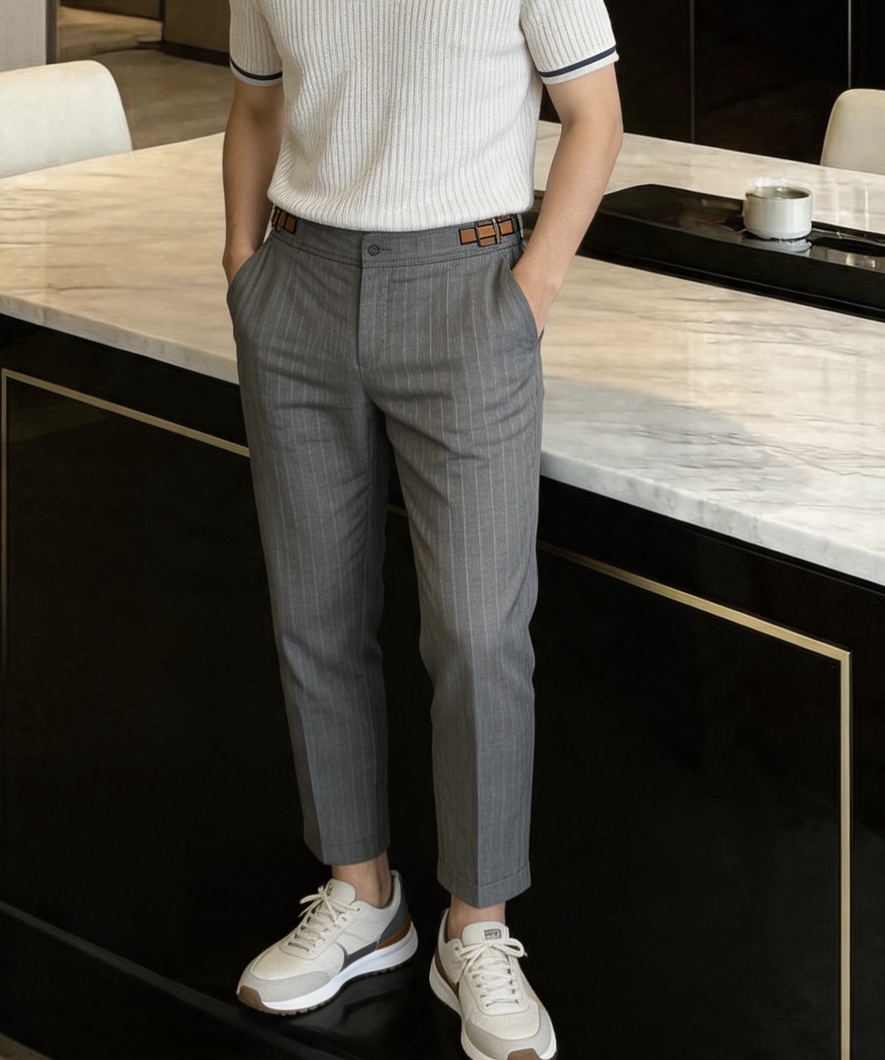 NO:912707,,ZEGNA Zegna Tencel linen casual trousers brand ZEGNA (Zegna), Italy's top men's luxury brand, specializes in high-end business casual fabrics, and is a benchmark brand for men's formal wear and light business. The fabric ratio is 90 Tencel (lyocell) linen. Tencel drape is smooth, moisture-absorbing and cooling, soft to the touch, and not prone to static electricity. Linen's natural breathable texture has its own drying properties, which improves heat dissipation in summer.  The two combine to avoid the shortcomings of pure linen, which is prone to wrinkles, and pure Tencel, which is too soft and collapsed, taking into account drape and breathability. The three-color version is hemp, charcoal black, and light gray herringbone pattern, suitable for different wearing scenarios. Waist adjustment system (iconic feature). Both sides are equipped with brown and black striped leather adjustment tabs + metal Japanese buckles, which can fine-tune the waist without a belt. The built-in invisible elastic band in the middle of the waist is highly tolerant to the waist and abdomen, and will not be restrained after sitting for long periods of time.  The cut is slightly straight and nine-point pants, the legs are moderately loose but not tight, the trouser legs are flat and closed, modifying the shape of the legs, taking into account the neatness of formal wear and the sense of casual relaxation; the diagonal pockets on the front side, without unnecessary open pockets, are visually clean and simple. The placket buttons with auxiliary materials are dark brown horn buttons, with brand logos engraved on the surface, and the texture is warm and wear-resistant  The fabric texture is light linen and natural color with herringbone weave, gray/black model with fine dark twill weave, low-key and layered, solid color from a distance and texture from close up. Stitching process, same color hidden thread process all over the body, neat hemming inside, no rough threads. Size 48-56 (model 180/140 wears 50),,zegna,19860909,ZEGNA杰尼亚天丝亚麻休闲西裤 品牌ZEGNA（杰尼亚）,意大利顶级男装奢牌,主打高端商务休闲面料成衣,是男士正装与轻商务标杆品牌. 面料配比90天丝（莱赛尔）亚麻 天丝垂坠顺滑、吸湿降温,触感柔和,不易起静电 亚麻天然透气肌理,自带干爽属性,提升夏季散热能力 二者结合规避纯亚麻易皱、纯天丝偏软塌的短板,兼顾垂感与透气. 三色版本麻本色、炭黑色、浅灰人字纹,适配不同穿搭场景 腰部调节系统（标志性特色） 两侧配有棕底黑条纹皮质调节袢+金属日字扣,无需皮带即可微调腰围,腰头中段内置隐形松紧带,对腰腹包容性强,久坐无束缚. 版型剪裁微直筒九分裤型,裤管适度宽松不紧绷,裤脚平整收口,修饰腿型,兼顾正装利落感与休闲松弛感；前侧斜插口袋,无多余明袋,视觉干净简约. 辅料工艺门襟纽扣深棕牛角扣,表面刻印品牌标识,质感温润耐磨 面料肌理浅麻本色款为人字纹织法,灰/黑款为细密暗斜纹,低调有层次,远看纯色近看有肌理 车线工艺全身同色藏线工艺,内里包边工整,无粗糙线头 规格48-56码（模特180/140穿50）,,zegna,,Men's clothing