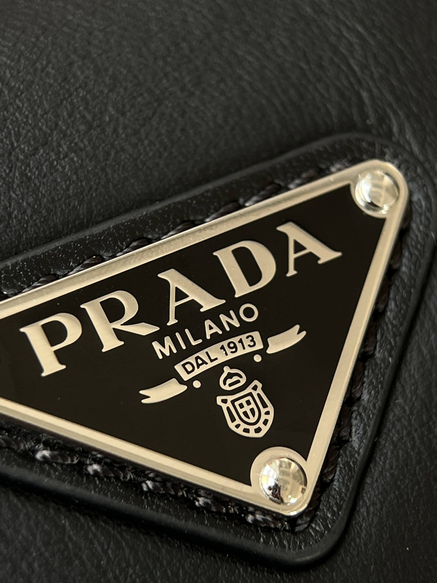 Prada Authentic triangle brand!