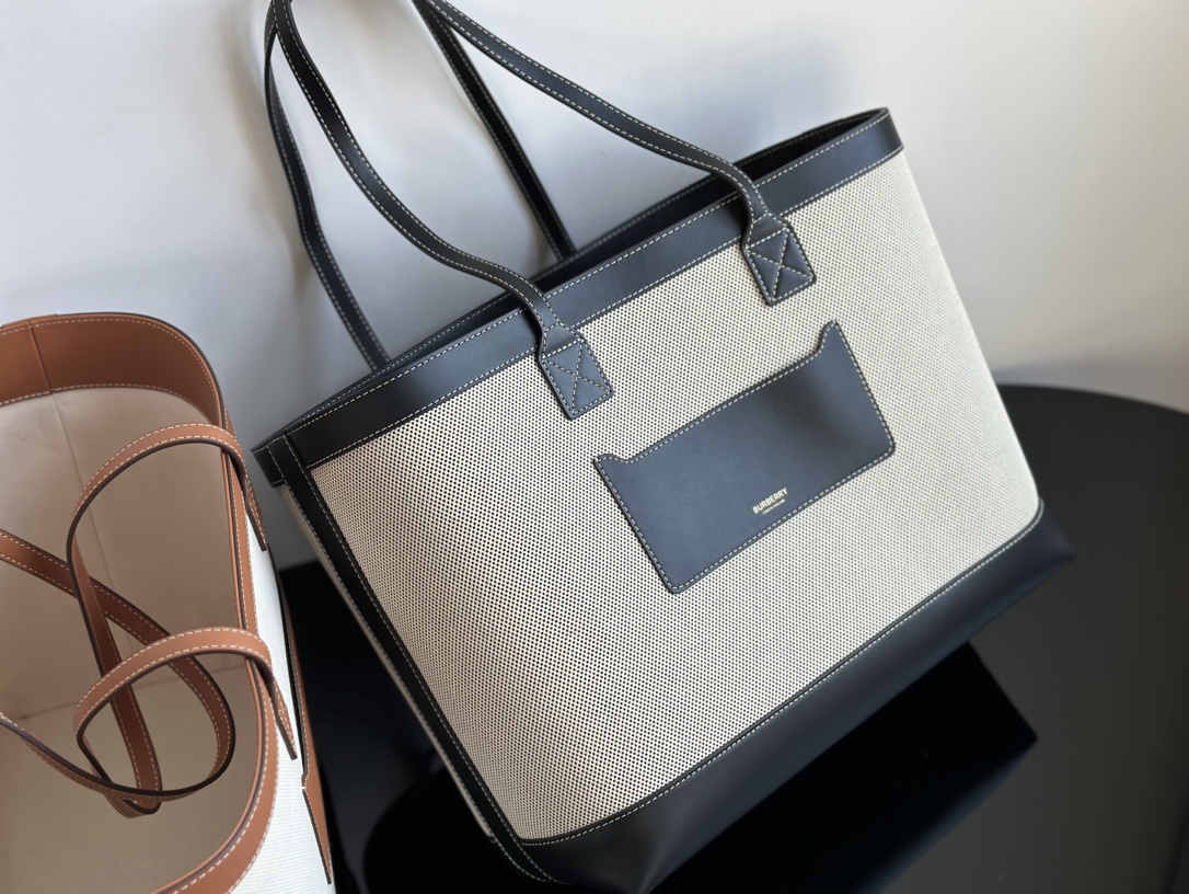 Burberry Made in Wandan, I got two black and gray and white and brown! This bag is huge and there is no box packaging!