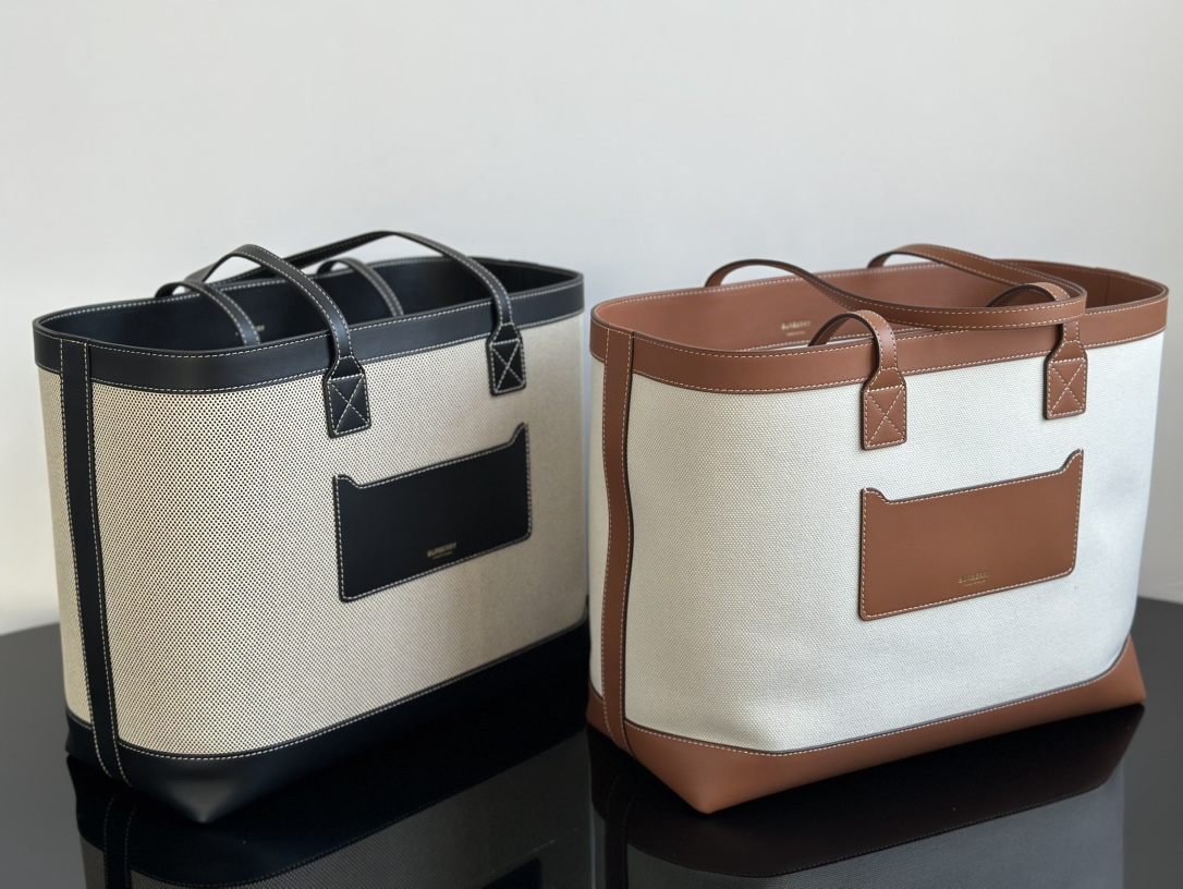 Burberry Made in Wandan, I got two black and gray and white and brown! This bag is huge and there is no box packaging!