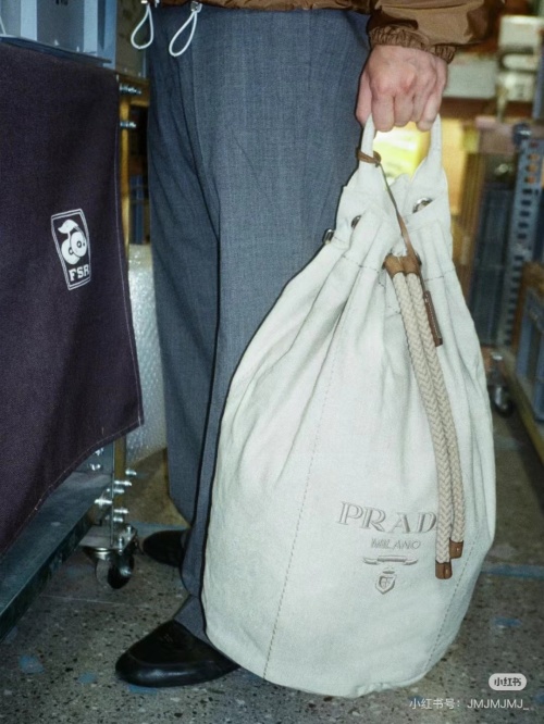 Prada Bucket Bag with Rope Drawstring and Leather Details, Beige 1 Prada Bucket Bag with Rope Drawstring and Leather Details, Beige