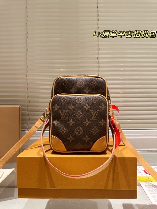 Louis Vuitton Vintage Camera Bag - Chic, Compact, and Effortlessly Stylish 1 Louis Vuitton Vintage Camera Bag - Chic, Compact, and Effortlessly Stylish