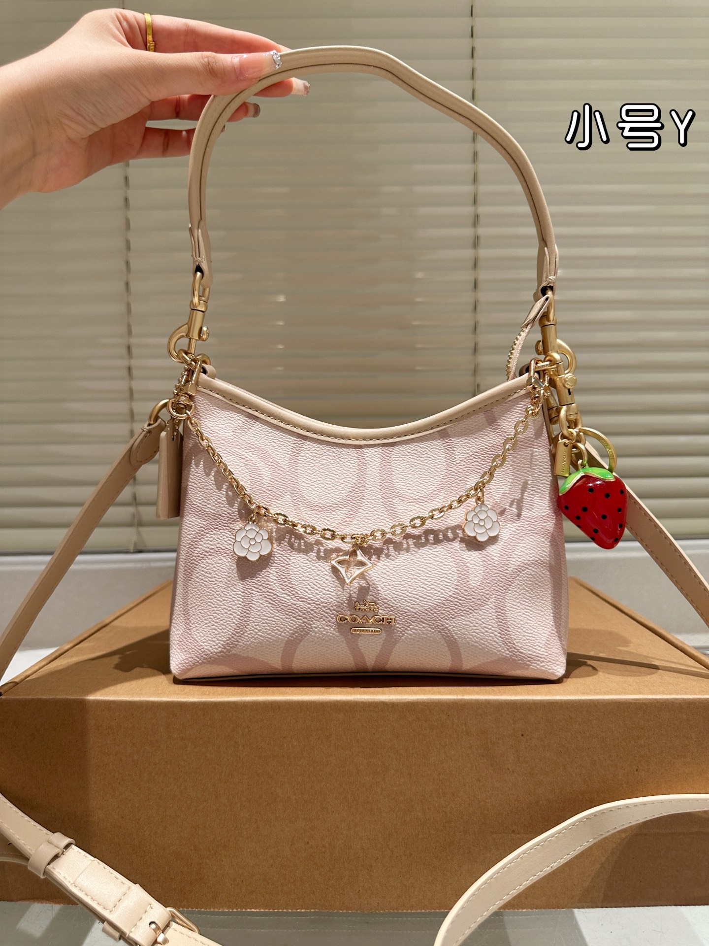 Versión de piel de vaca con colgante, nuevo modelo de Coach laurel 19 pequeño vagabundo, ¡salió la talla pequ…