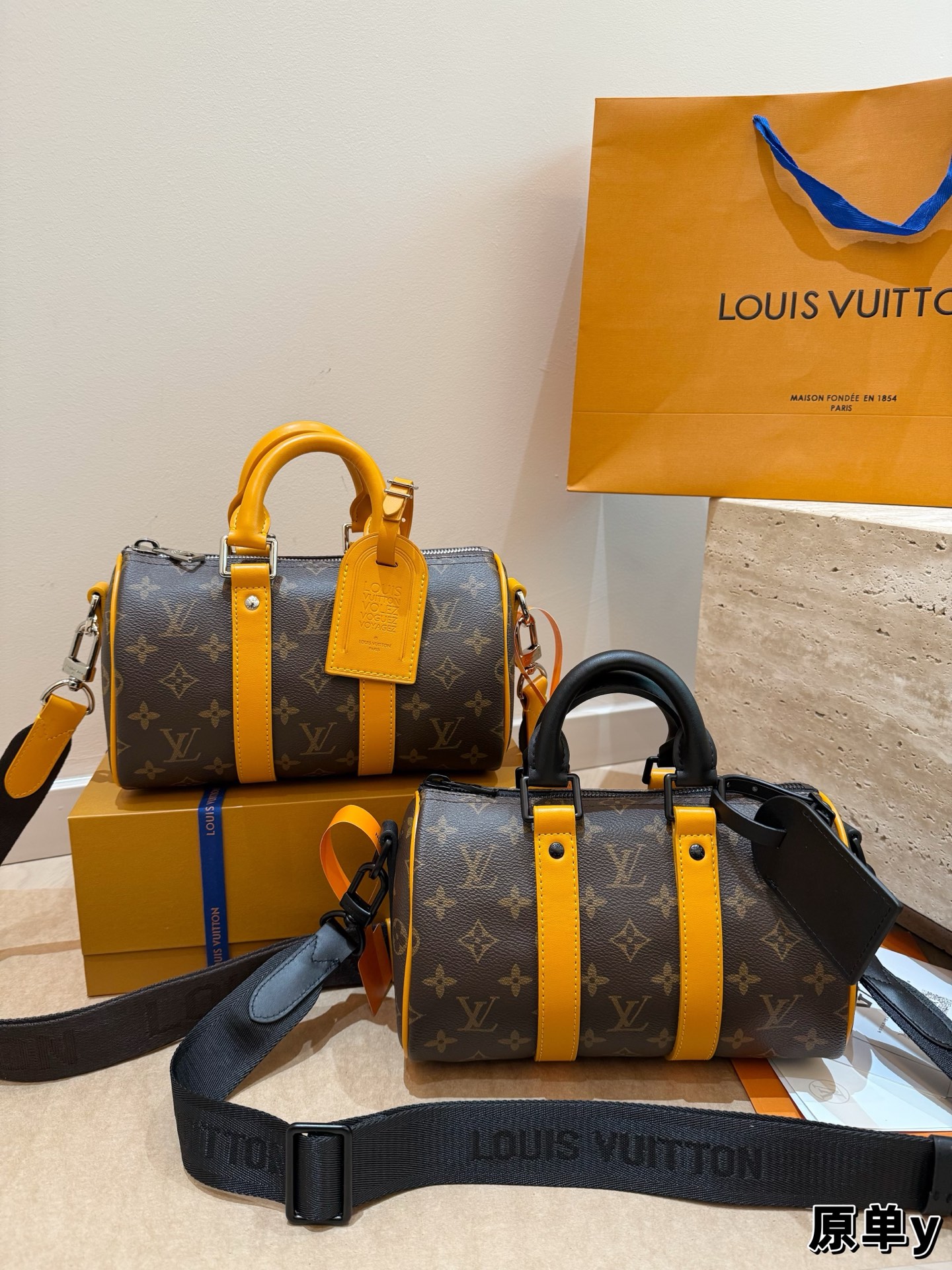 P285 | Keepall Bandouliere City Bag Made Of Monogram Macassar Canvas And Colored Leather, Part Of The Colormania Collection. The Color On The Side Straps And Top Handles Echoes The Color Of The Textile Lining. The Traditional Name Brand Has Been Reinterpreted Using House's Vintage "Volez, Voguez, Voyagez" Signature. | | Size: 25cm With Box