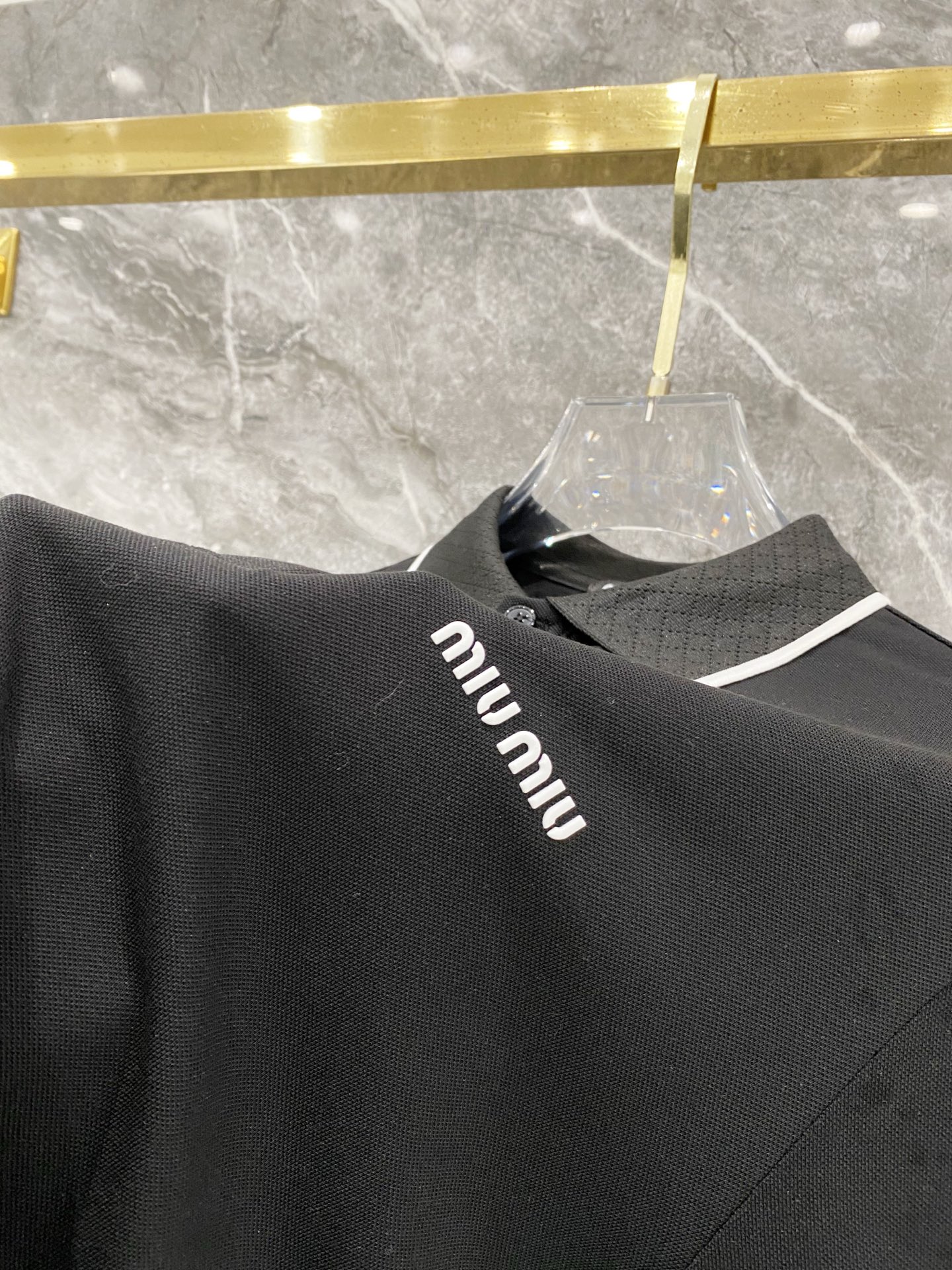 MIUMIU men Miu 2026 Polo logo — photo 6