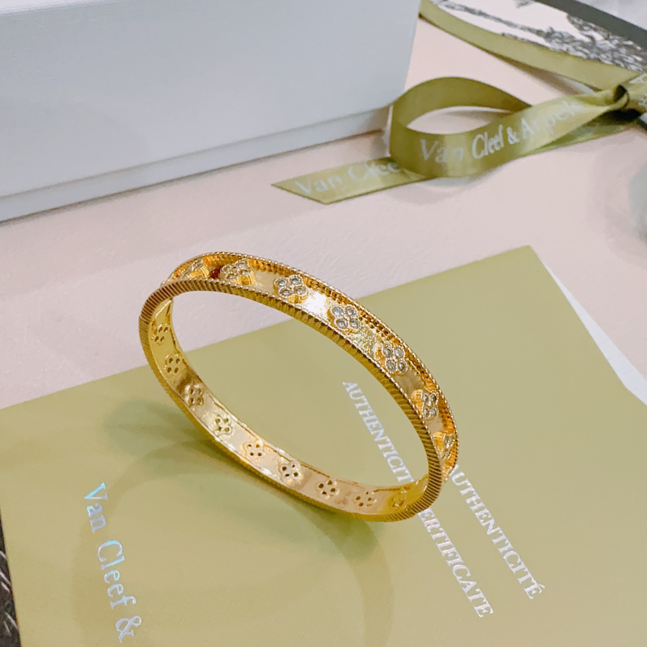 Van Cleef Arpels Perlee Clovers bracelet Yellow gold with diamond accents white gold with diamond accents 17cm
