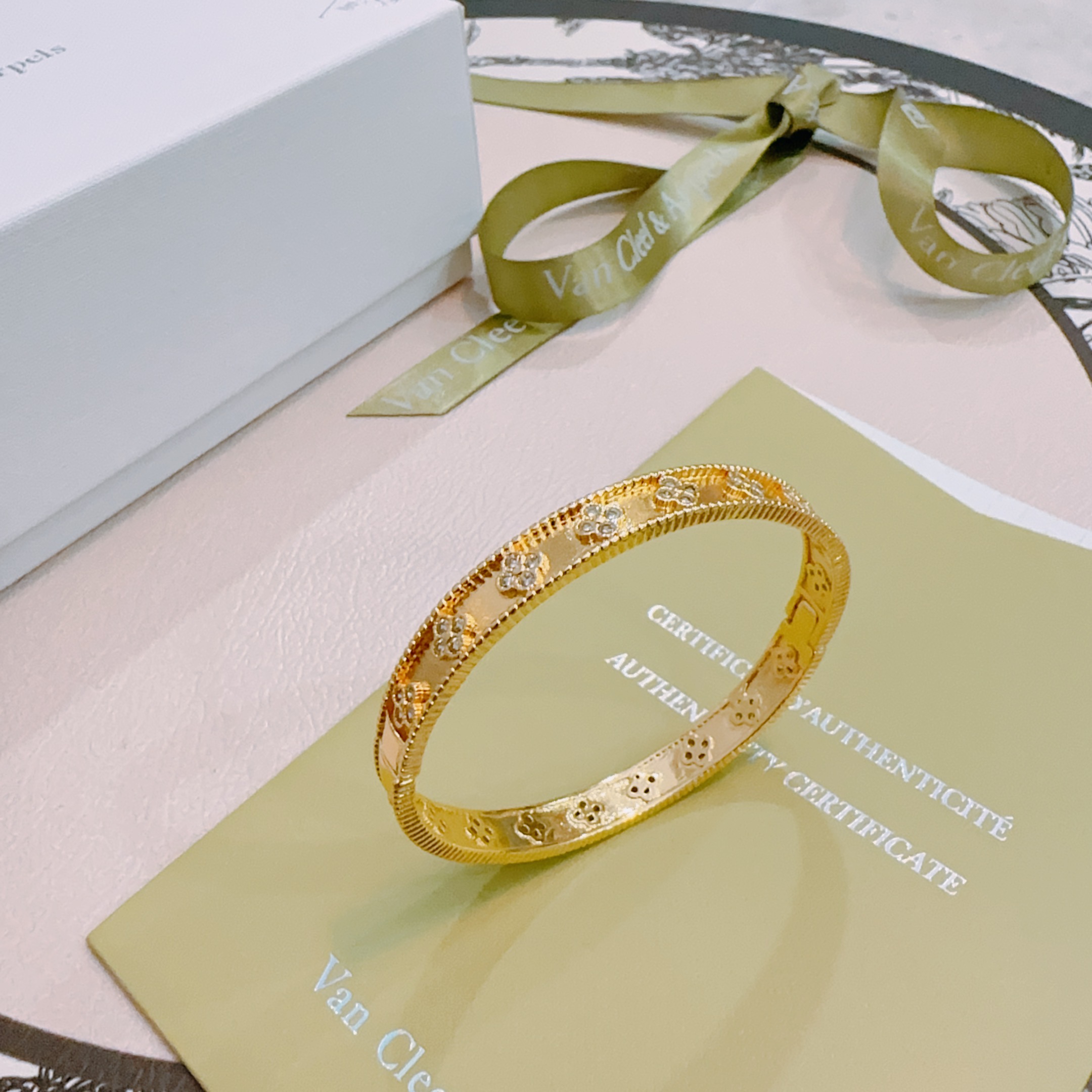 Van Cleef Arpels Perlee Clovers bracelet Yellow gold with diamond accents white gold with diamond accents 17cm