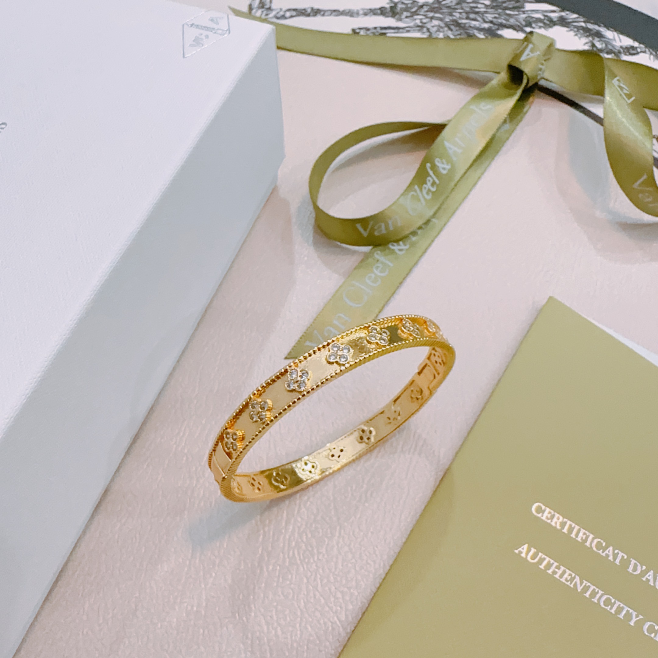 Van Cleef Arpels Perlee Clovers bracelet Yellow gold with diamond accents white gold with diamond accents 17cm