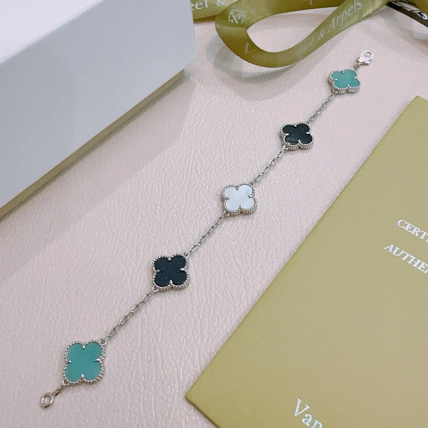 Van Cleef Arpels Alhambra bracelet Silver-toned metal with turquoise black aventurine and white mother-of-pearl clover motifs 17cm