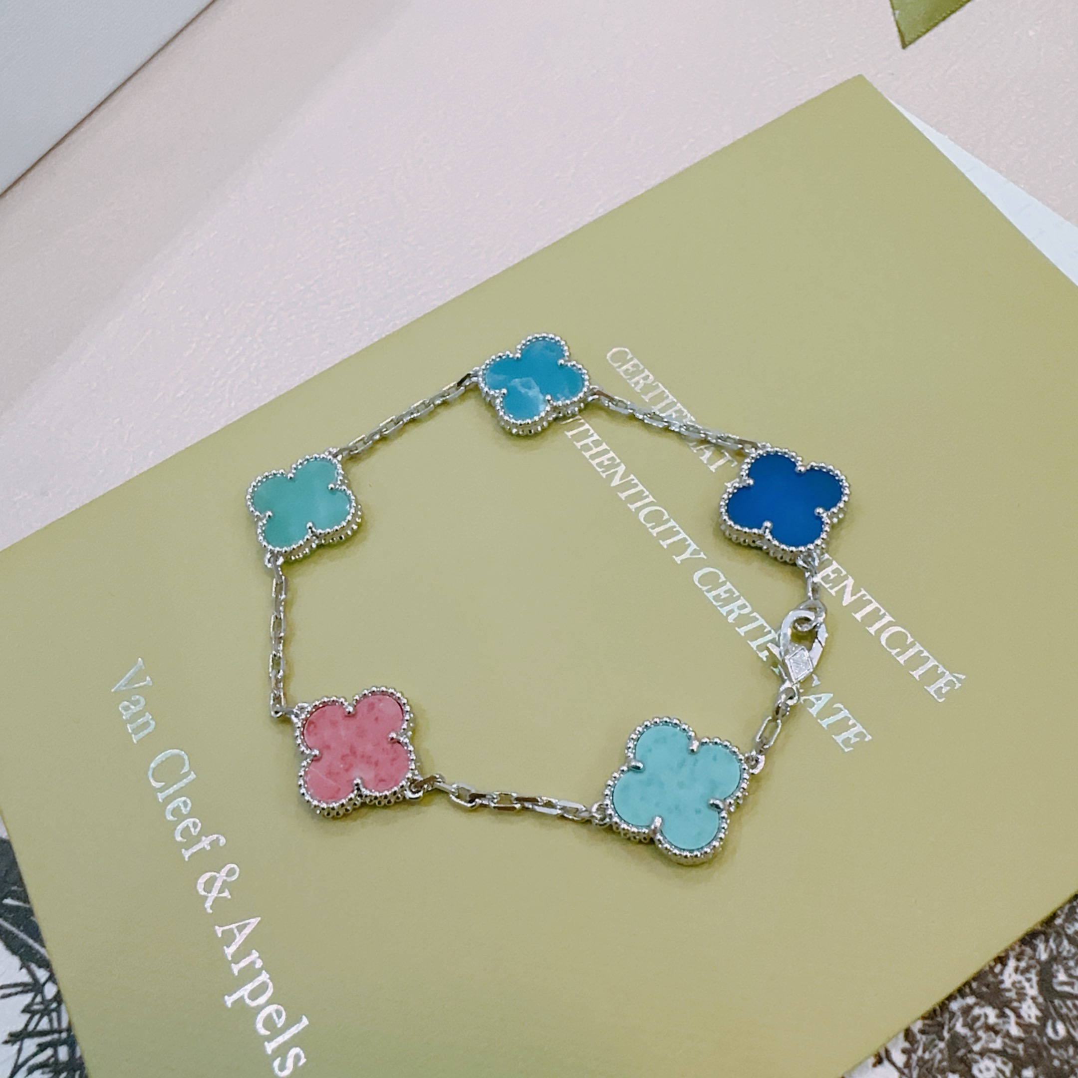 Van Cleef Arpels Alhambra bracelet silver-toned metal with multicolor clover inlays turquoise pink royal blue bright blue 18cm