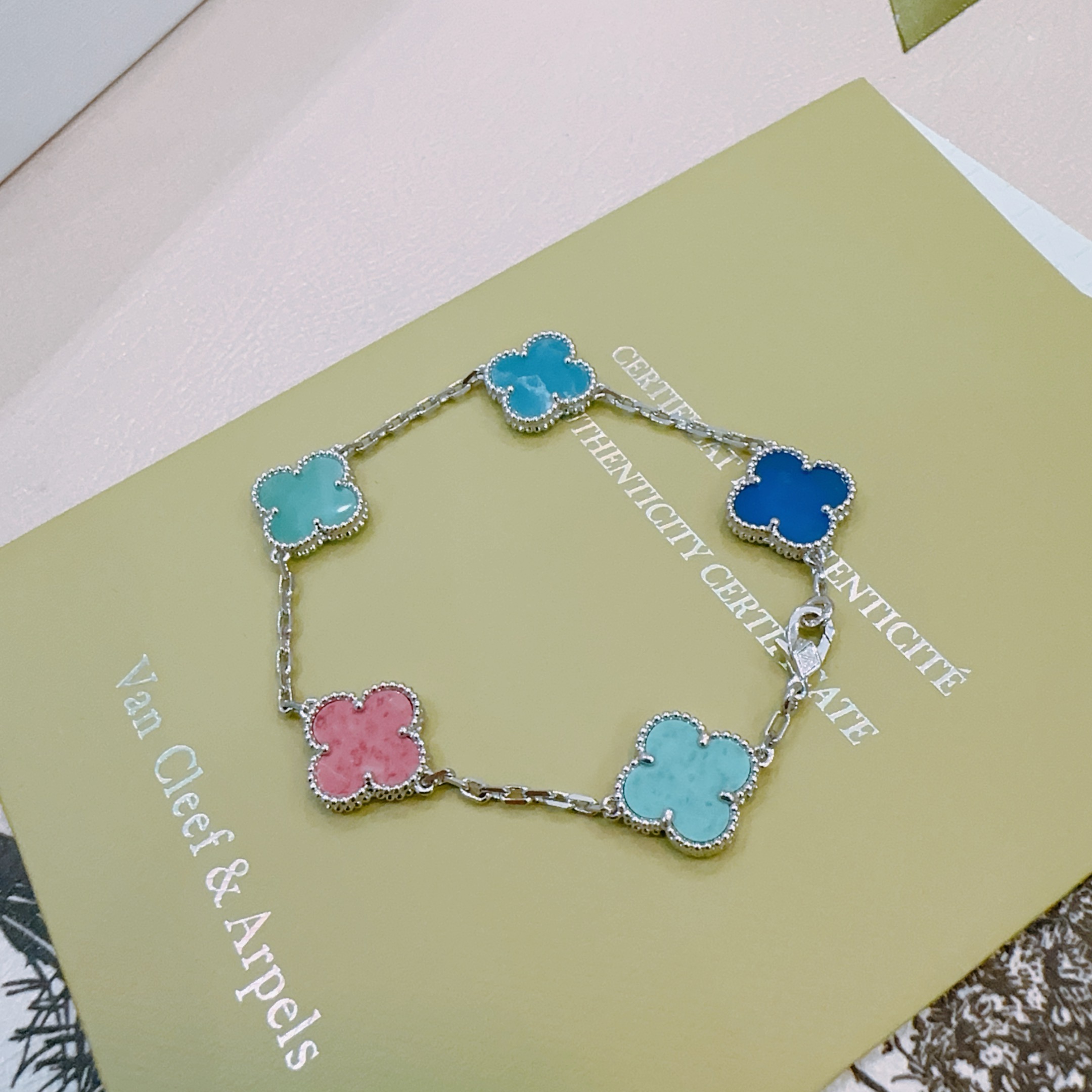 Van Cleef Arpels Alhambra bracelet silver-toned metal with multicolor clover inlays turquoise pink royal blue bright blue 18cm