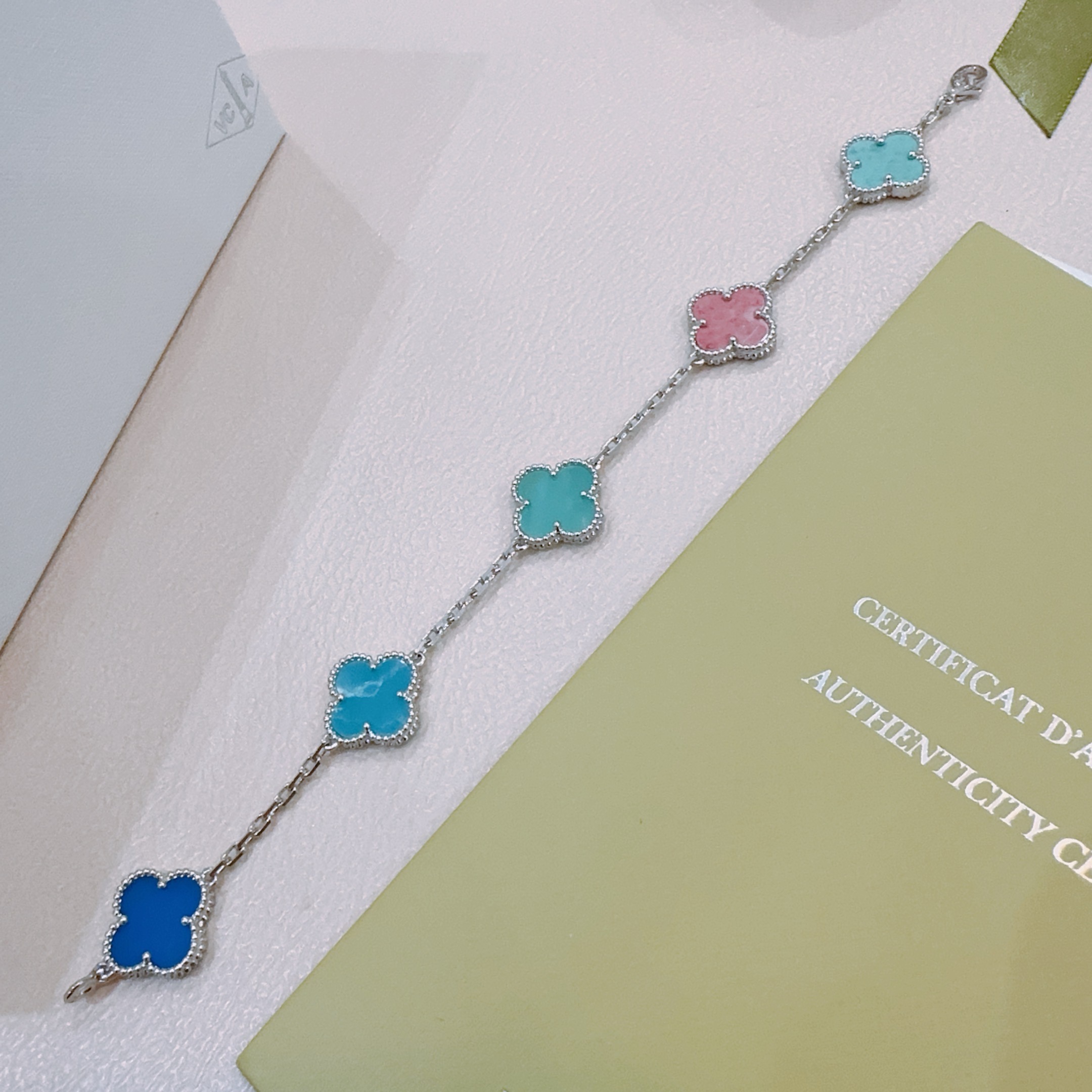 Van Cleef Arpels Alhambra bracelet silver-toned metal with multicolor clover inlays turquoise pink royal blue bright blue 18cm