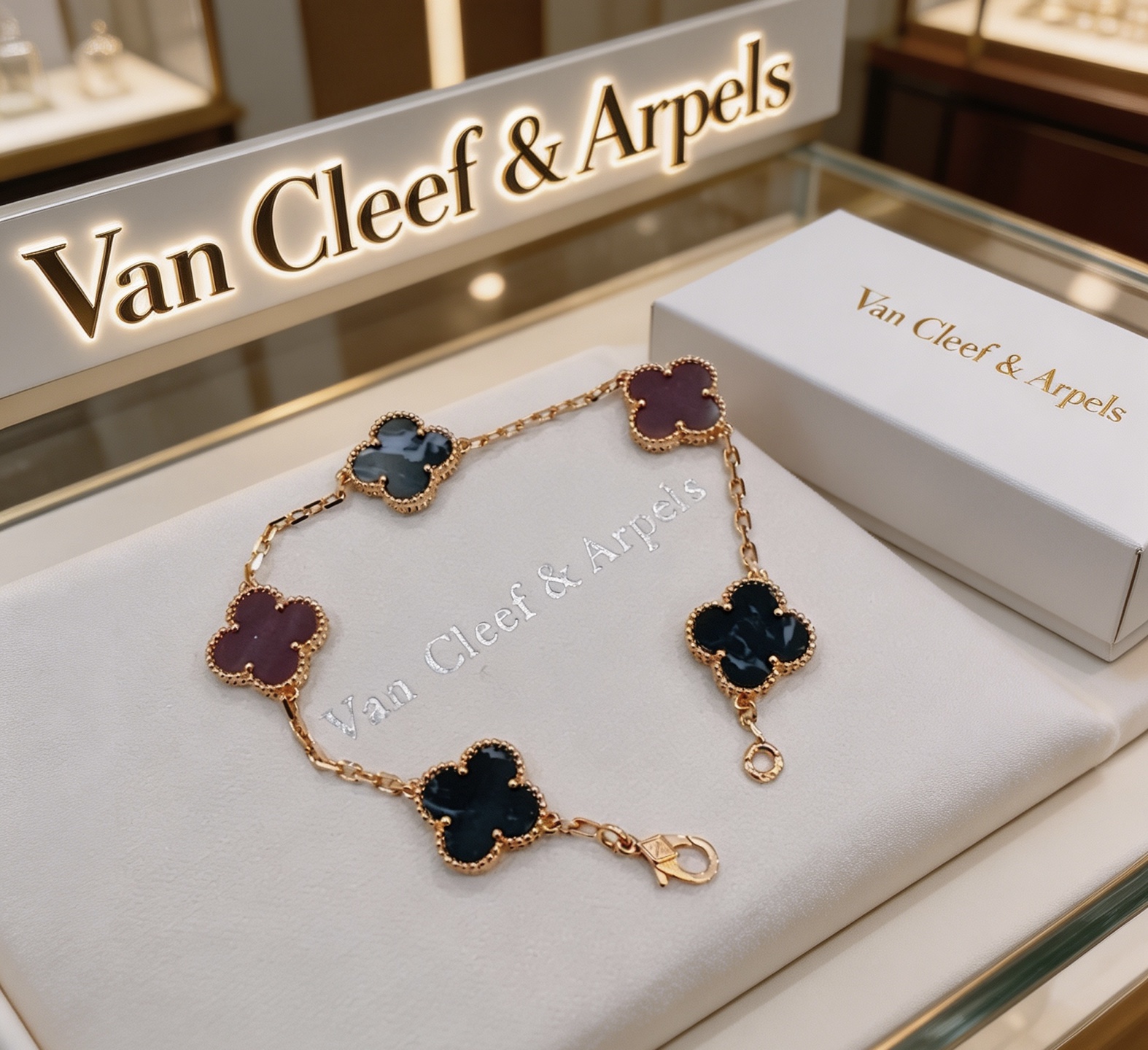 Van Cleef Arpels Vintage Alhambra bracelet Yellow gold metal with blue pietersite and purple chalcedony clover motifs 19cm