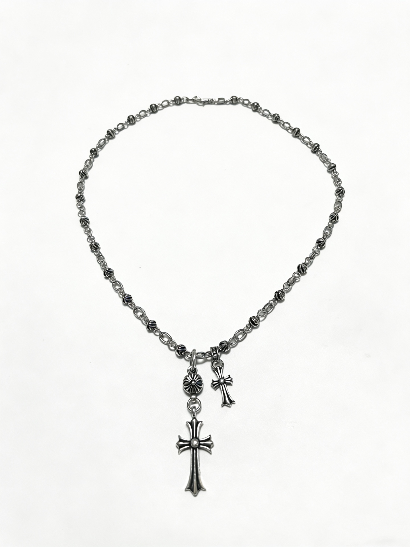NO:879519,New [counter quality] Chrome Hearts multi-element retro cross necklace, double cross pendant, concave and convex shapes with different pattern design styles, showing a distinctive cross. The Scout flower is the symbol of Chrome Hearts, so it is more durable. Genuine pattern-printed Chrome Hearts distinguishes the ordinary light version in the market. Match the version and standard quality. Look at the printing details. The degree of retro gray oxidation. Seiko version!  !  !  Purely handmade, authentic molded fashion essentials, can be worn by both men and women, same style for couples, original official website, rock punk Thai silver style, retro elements, trendy and versatile, boutique jewelry, chrome hearts, chrome hearts, necklace19860909新款【专柜品质】Chrome Hearts克罗心多元素复古十字架项链 双十字架吊坠 凹凸造型不同的花纹设计风格 呈现出与众不同 十字架 童军花是克罗心的志 所以更经久不衰 正品打版Chrome Hearts克罗心 区别市场普通轻版 对版对标品质 看字印细节 复古做旧灰氧程度.精工版本！！！ 纯手工打造 正品开模潮流时尚必备 男女均可佩戴 情侣同款 官网原版 摇滚朋克泰银风格 复古元素 潮流百搭,饰品精品,chrome hearts,chrome hearts,necklace,Jewelry