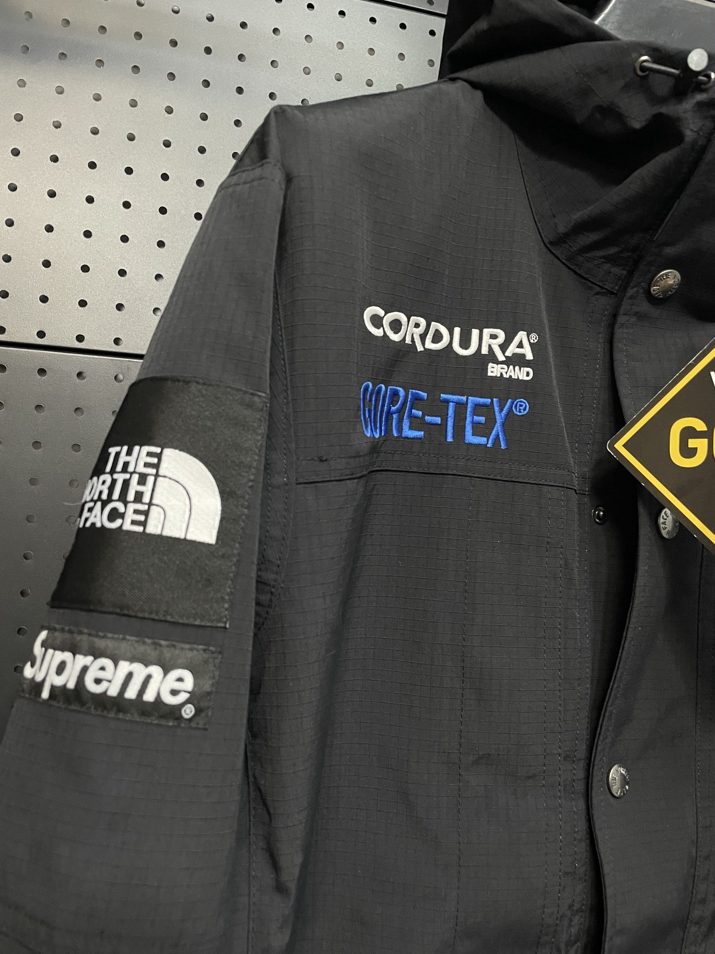 TNF SUP コラボ バイカーズ パッチワーク フード付き シェルジャケット 撥水加工 男女兼用