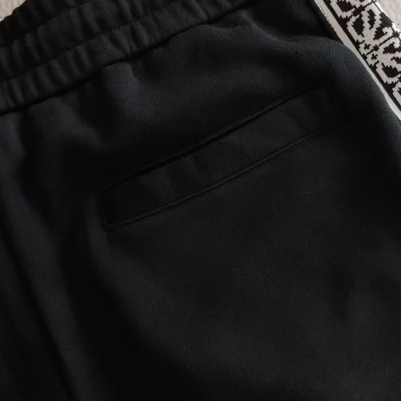LOEWE 罗意威 拼色织带字母刺绣LOGO标识长裤裤
