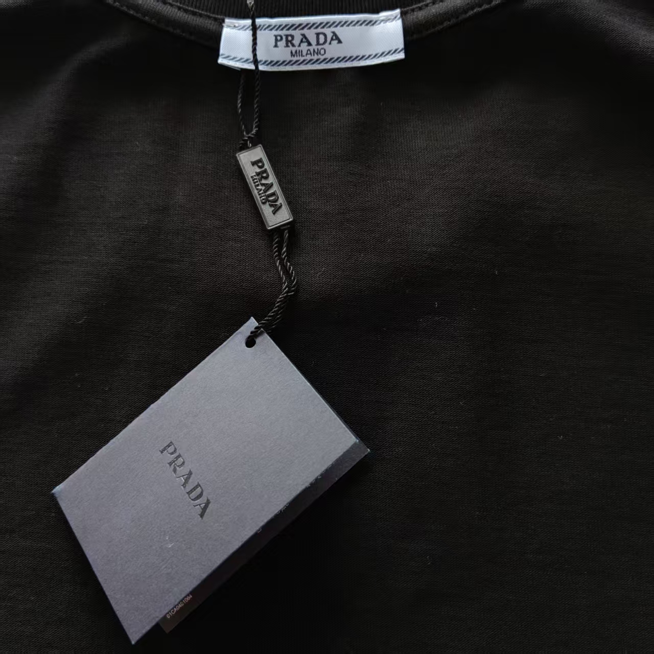 PRADA 普拉达 大幅拼色字母三角标烫钻