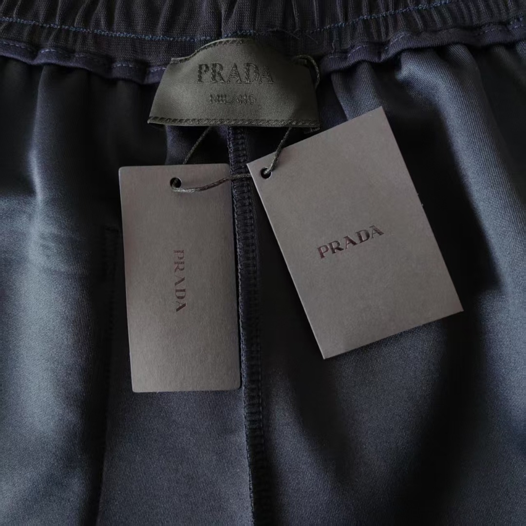 PRADA 普拉达 下摆拉链三角标LoGO标识五分裤