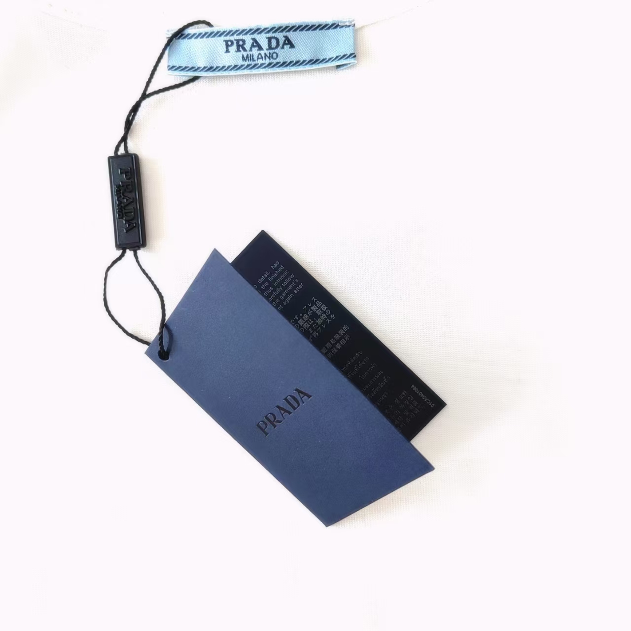 PRADA 普拉达 拼接字母印花金属三角标短袖