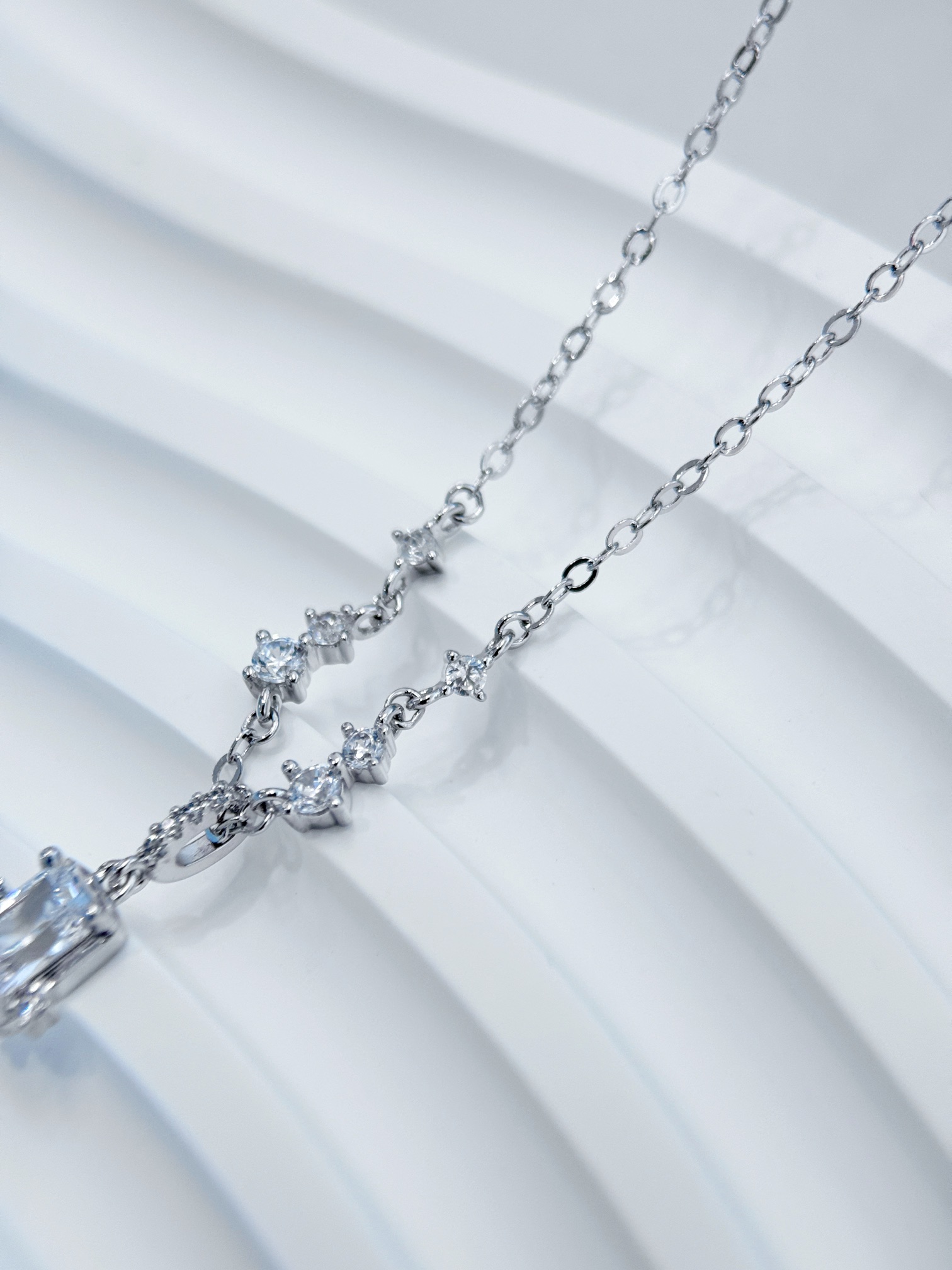 Set with delicate cubic zirconia, this necklace features six stones - Comprehensive 4
