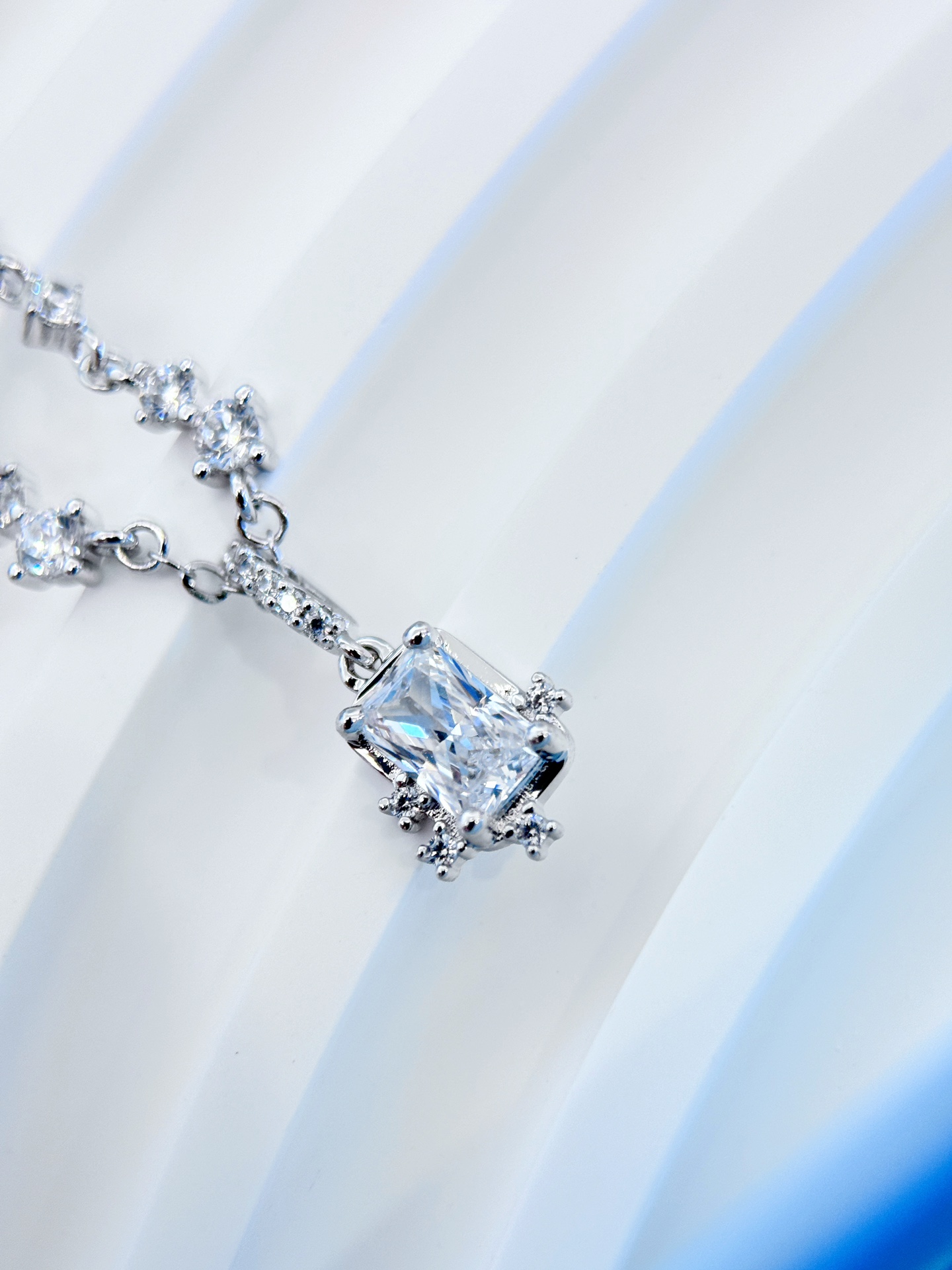 Set with delicate cubic zirconia, this necklace features six stones - Comprehensive 2